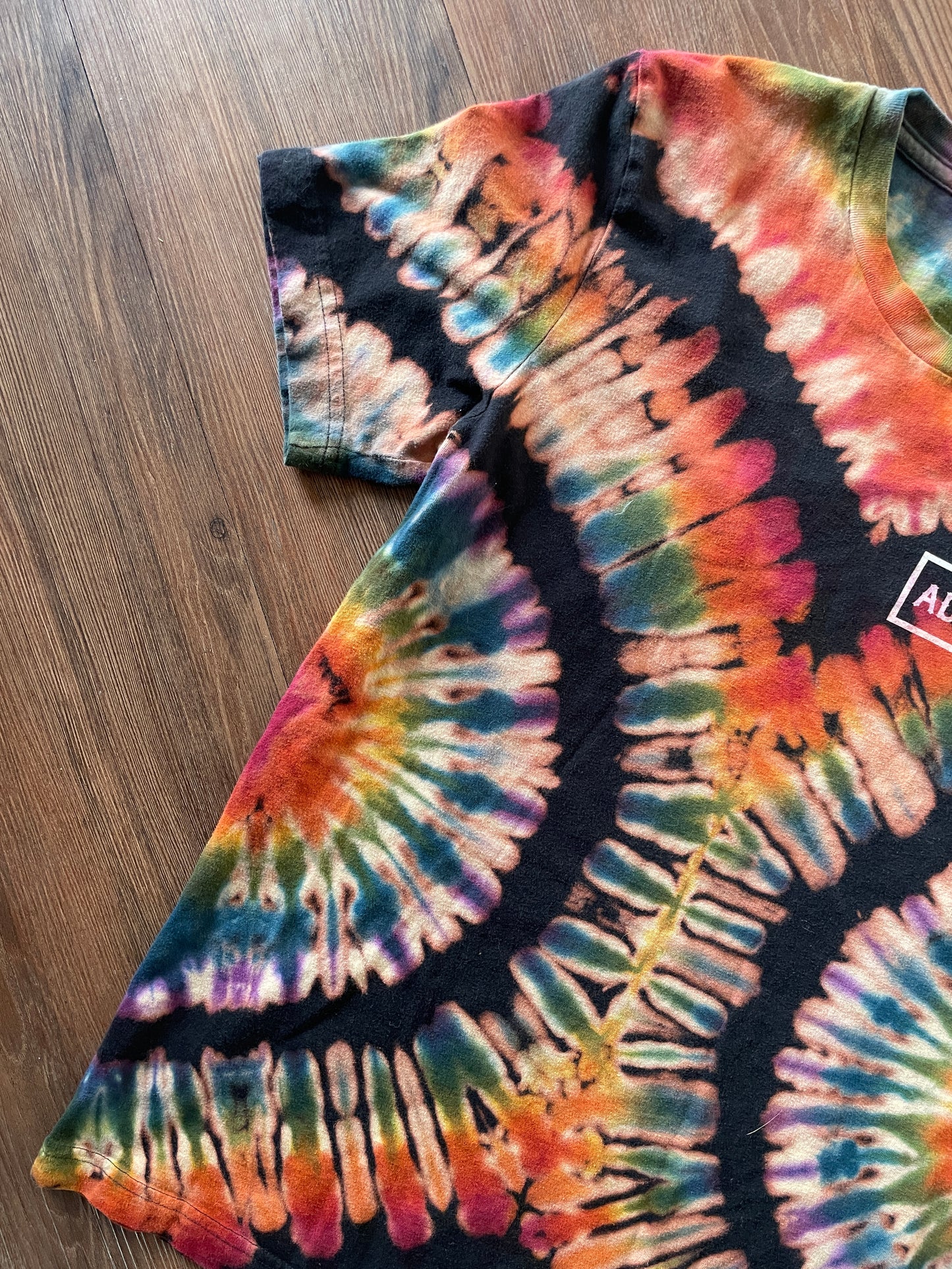 MEDIUM Men’s Adventurer Crag to Crux Handmade Tie Dye Sweatshirt | Black and Rainbow Pleated Short Sleeve