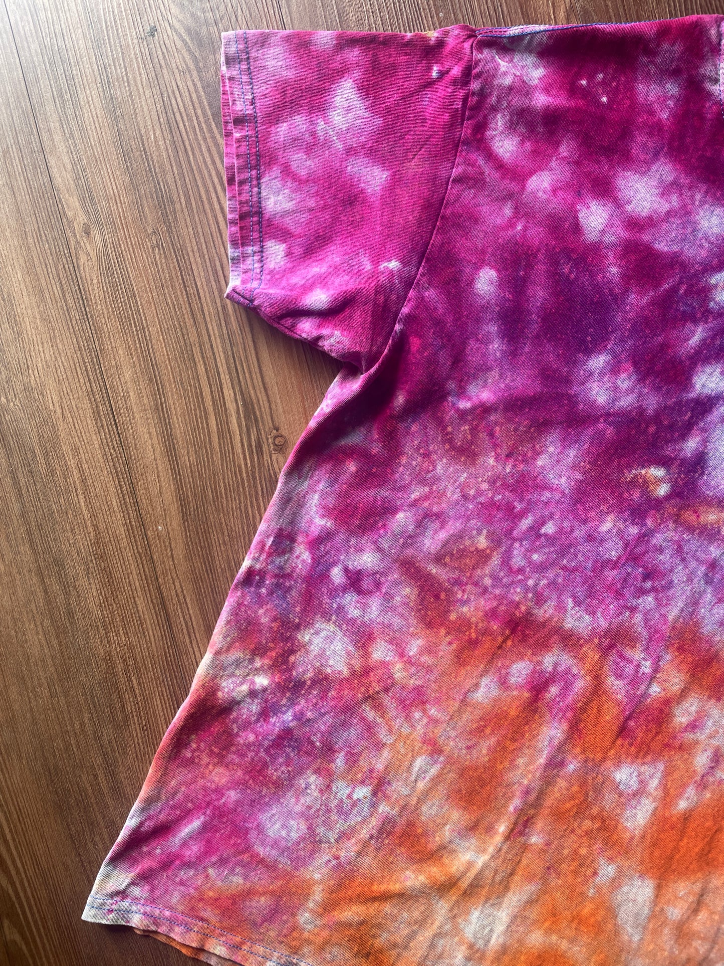 Medium Men’s Moab Utah Handmade Tie Dye T-Shirt with Embroidered Kokopelli Details | Pink and Orange Galaxy Reverse Tie Dye Short Sleeve