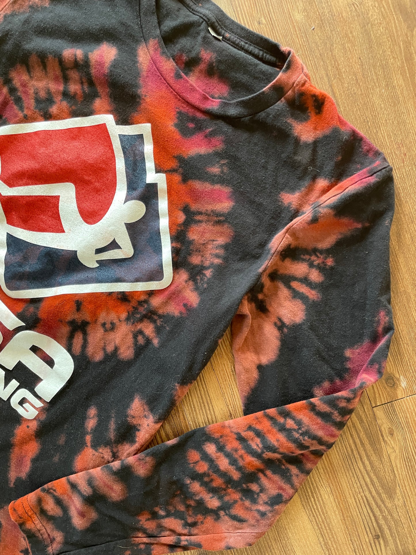Small Men’s USA Climbing Handmade Tie Dye T-Shirt | Black, Red, and Orange Pleated Tie Dye Long Sleeve