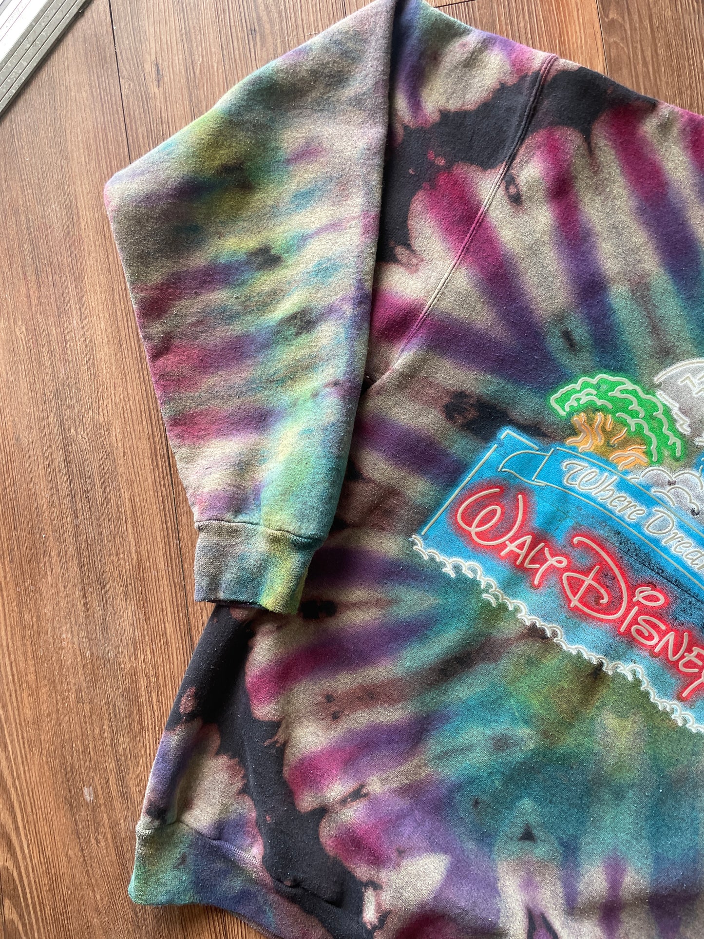 MEDIUM Men’s Walt Disney World Castle Reverse Tie Dye Sweatshirt | Black, Pink, and Purple Pleats Reverse Tie Dye Long Sleeve