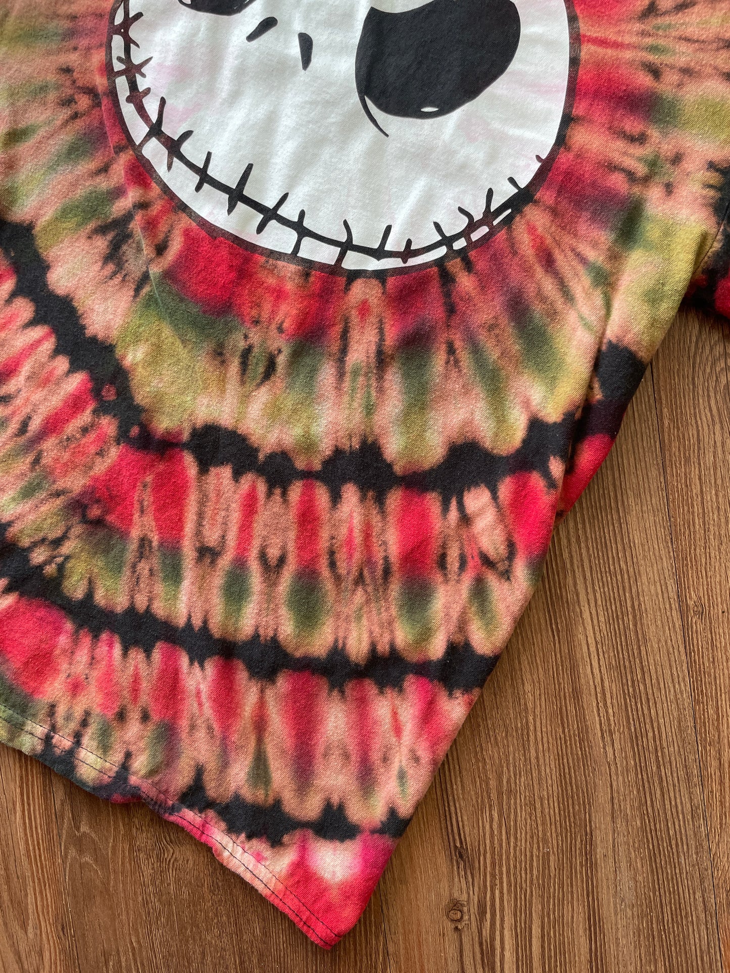 MEDIUM Men’s The Nightmare Before Christmas Reverse Tie Dye T-Shirt | Black, Green, and Red Pleated Tie Dye Short Sleeve Top