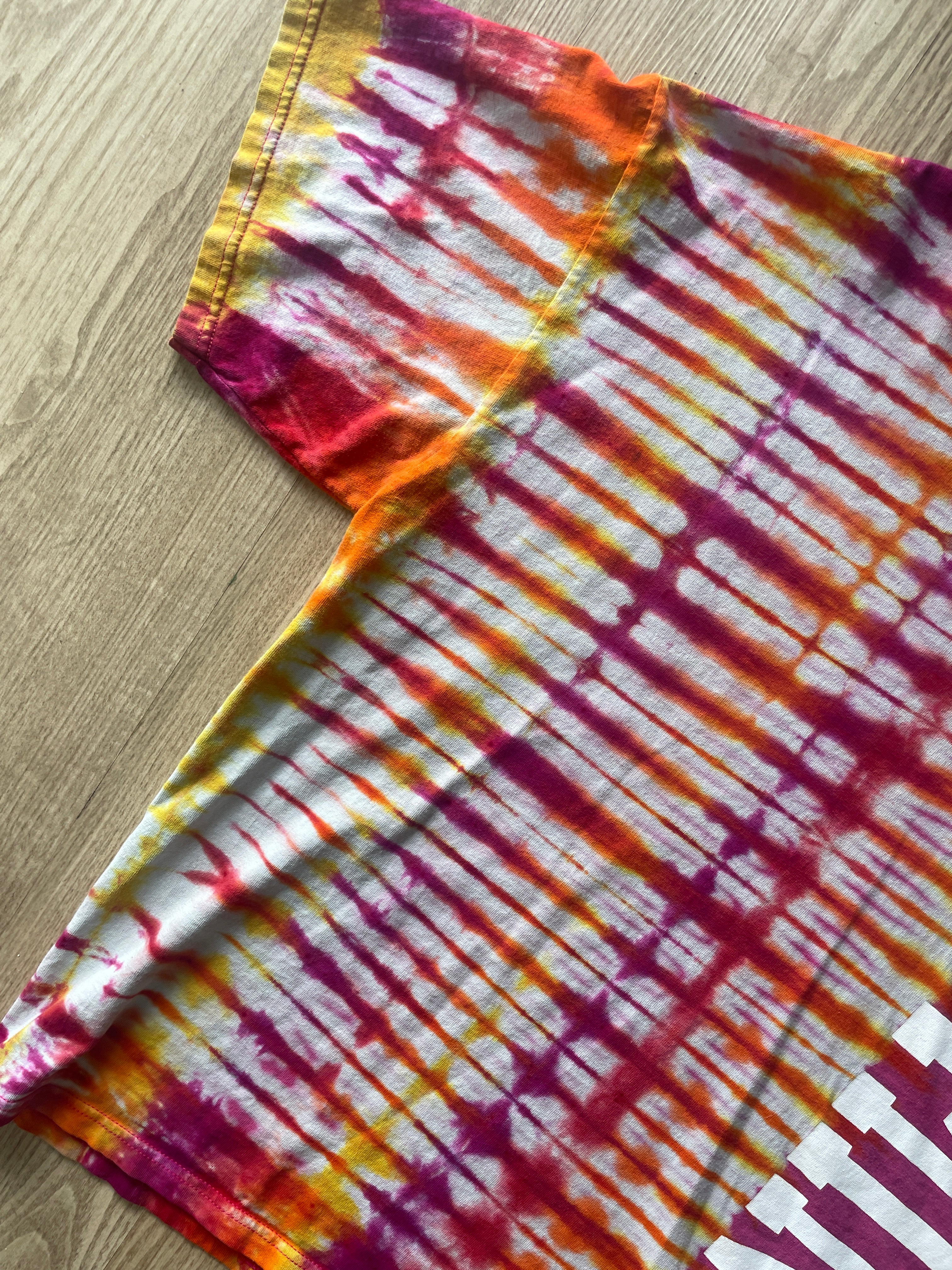 XL Men’s Wyoming Cowboys Handmade Tie Dye T-Shirt | One-Of-a-Kind Pink and Orange/Yellow/Red/Purple Short Sleeve Shirt | Wyoming Gift