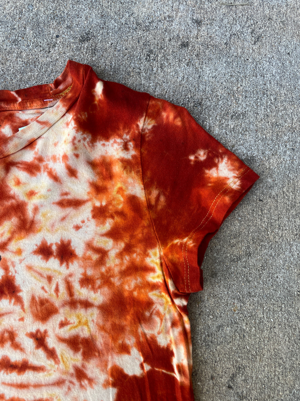 Hand-Printed Skeleton Rock On Orange and Yellow Reverse Tie Dye Short Sleeve T-Shirt | Junior's Size Medium