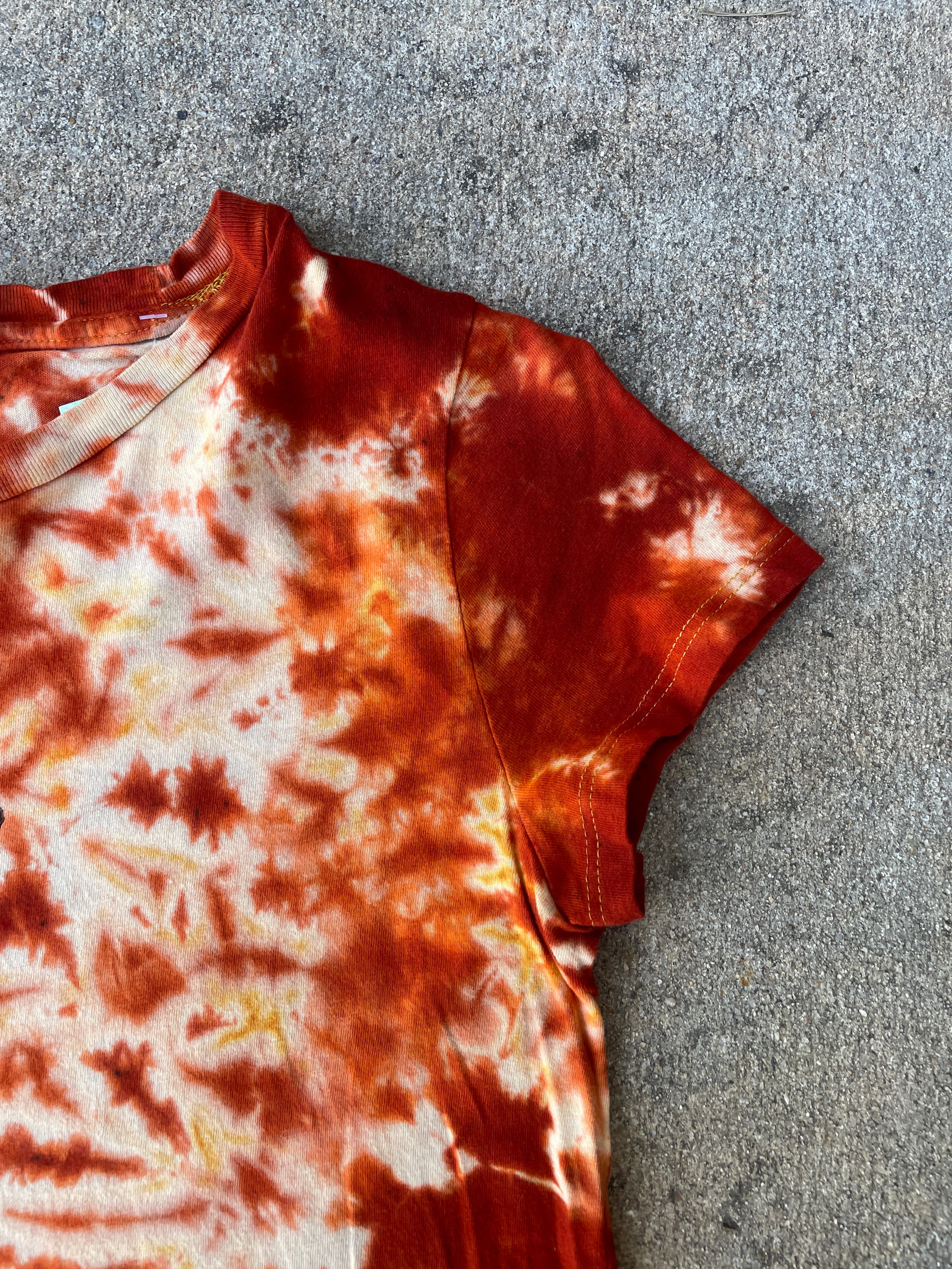 Hand-Printed Skeleton Rock On Orange and Yellow Reverse Tie Dye Short Sleeve T-Shirt | Junior's Size Medium