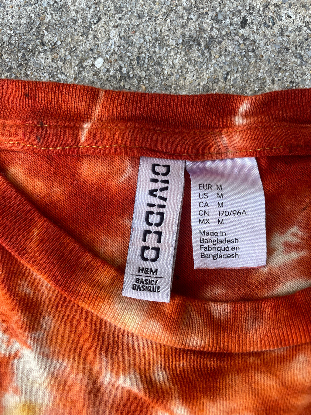 Hand-Printed Skeleton Rock On Orange and Yellow Reverse Tie Dye Short Sleeve T-Shirt | Junior's Size Medium