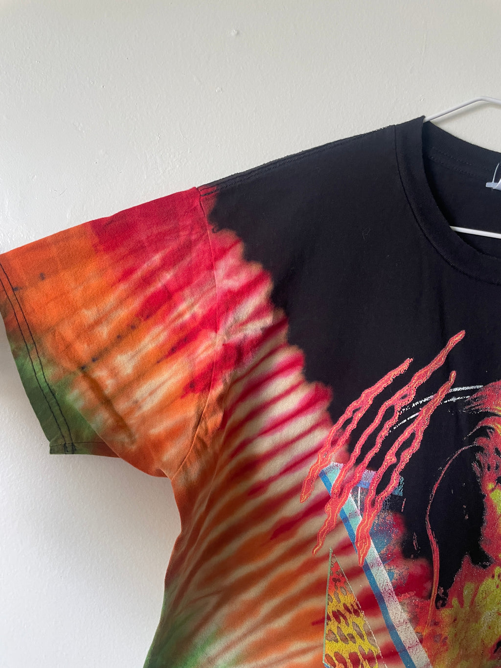 The Cheetah Handmade Tie Dye Short Sleeve T-Shirt | One-Of-a-Kind Upcycled Black and Rainbow Pleated Top | Men's Large