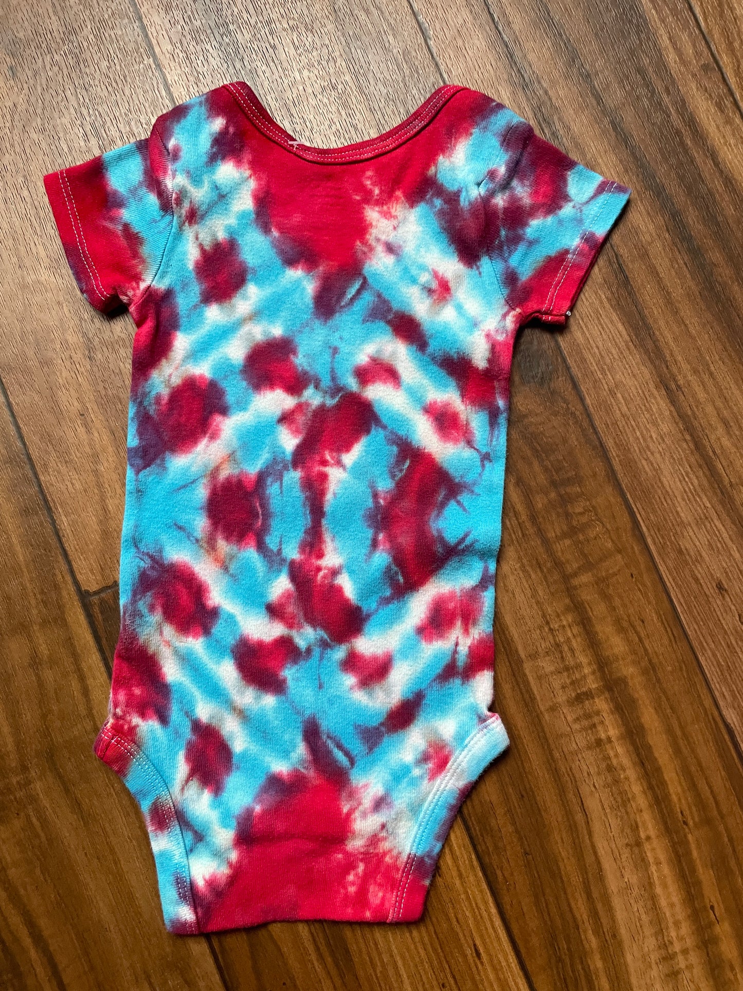 12 MO Red, White, and Blue Ski Boot Tie Dye Short Sleeve Baby Onesie