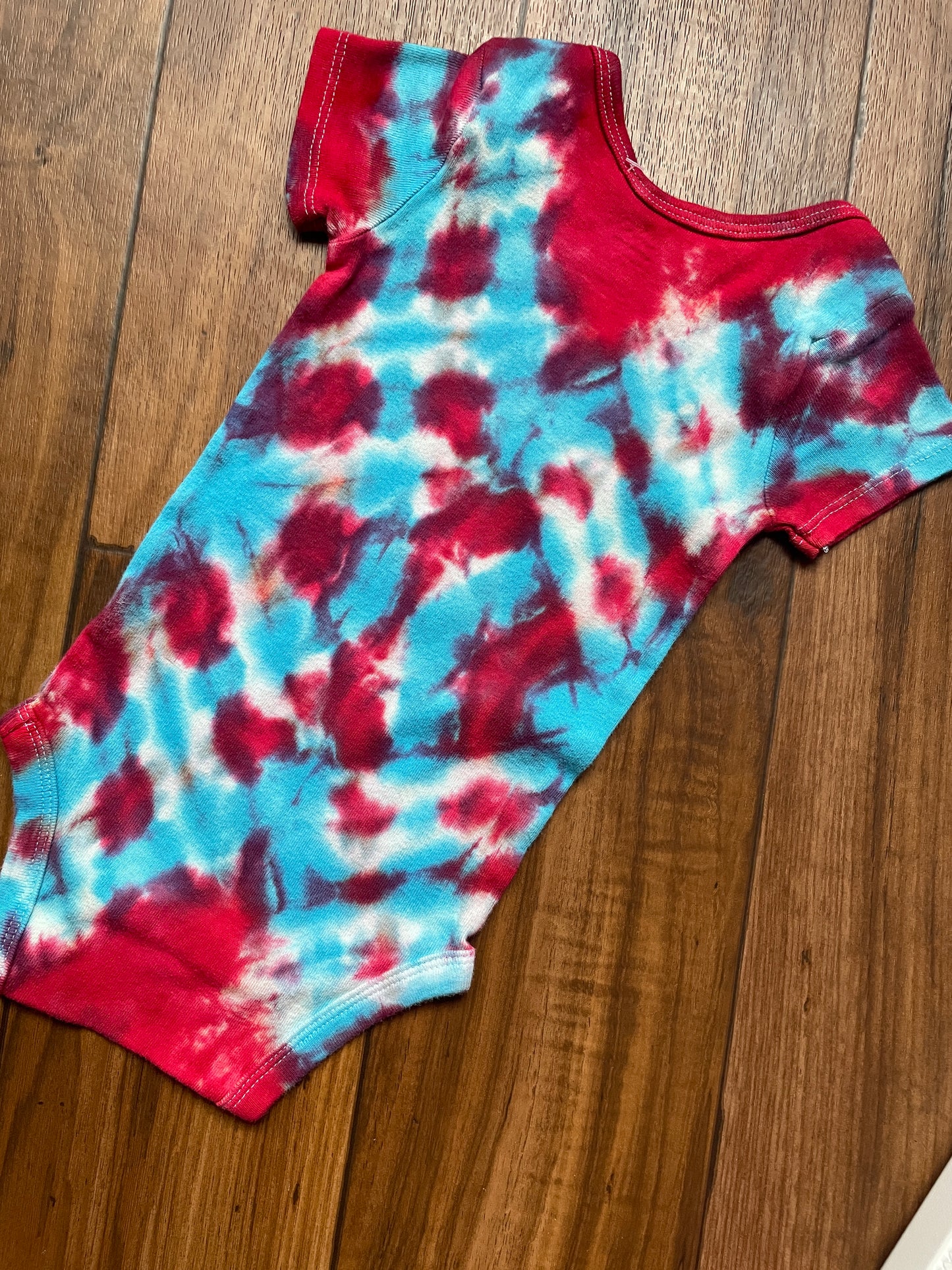 12 MO Red, White, and Blue Ski Boot Tie Dye Short Sleeve Baby Onesie