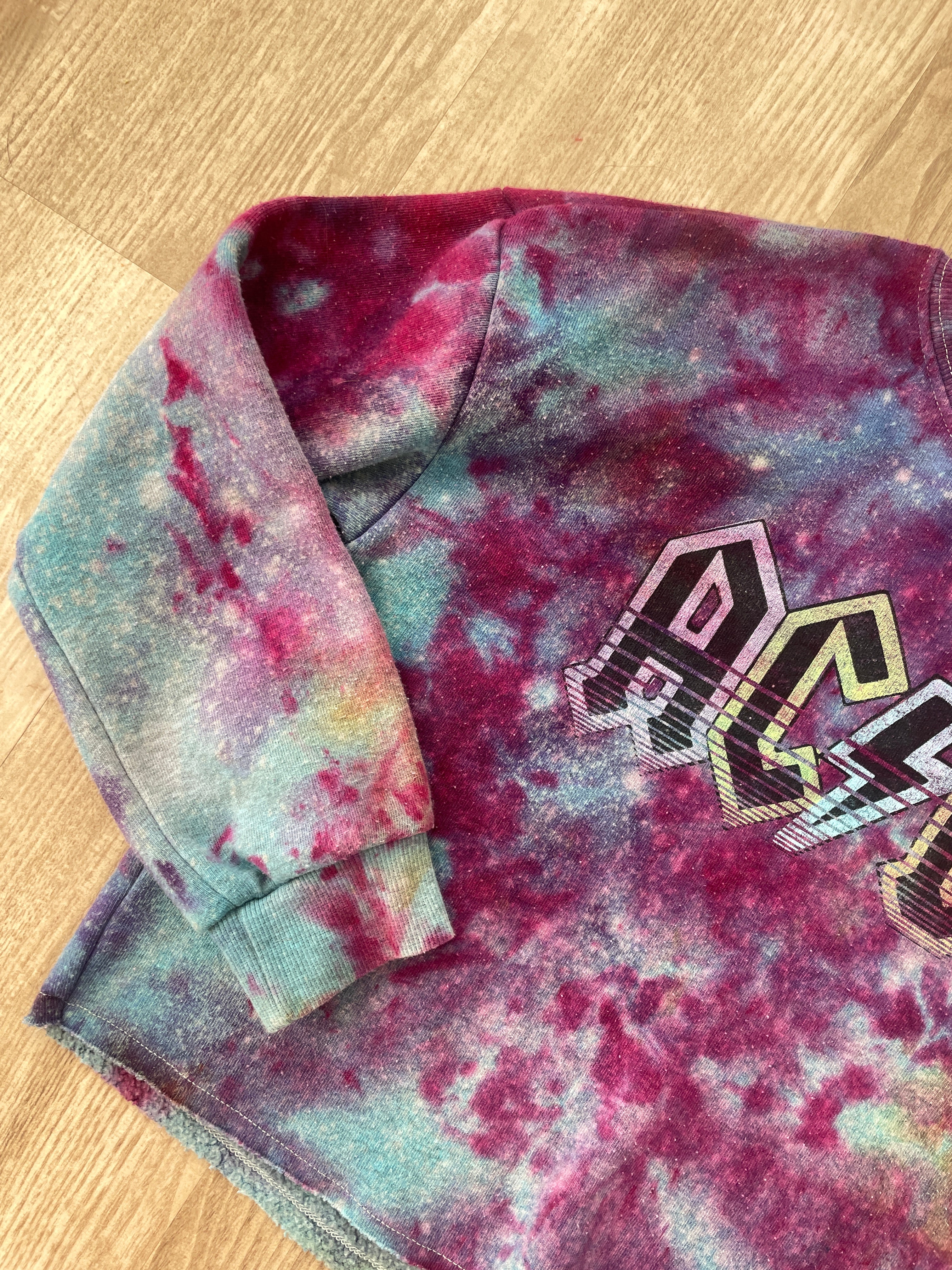 Medium Youth AC/DC Handmade Galaxy Tie Dye Cropped Length Sweatshirt | One-Of-a-Kind Upcycled Blue, Purple, and Pink Ice Dye Top