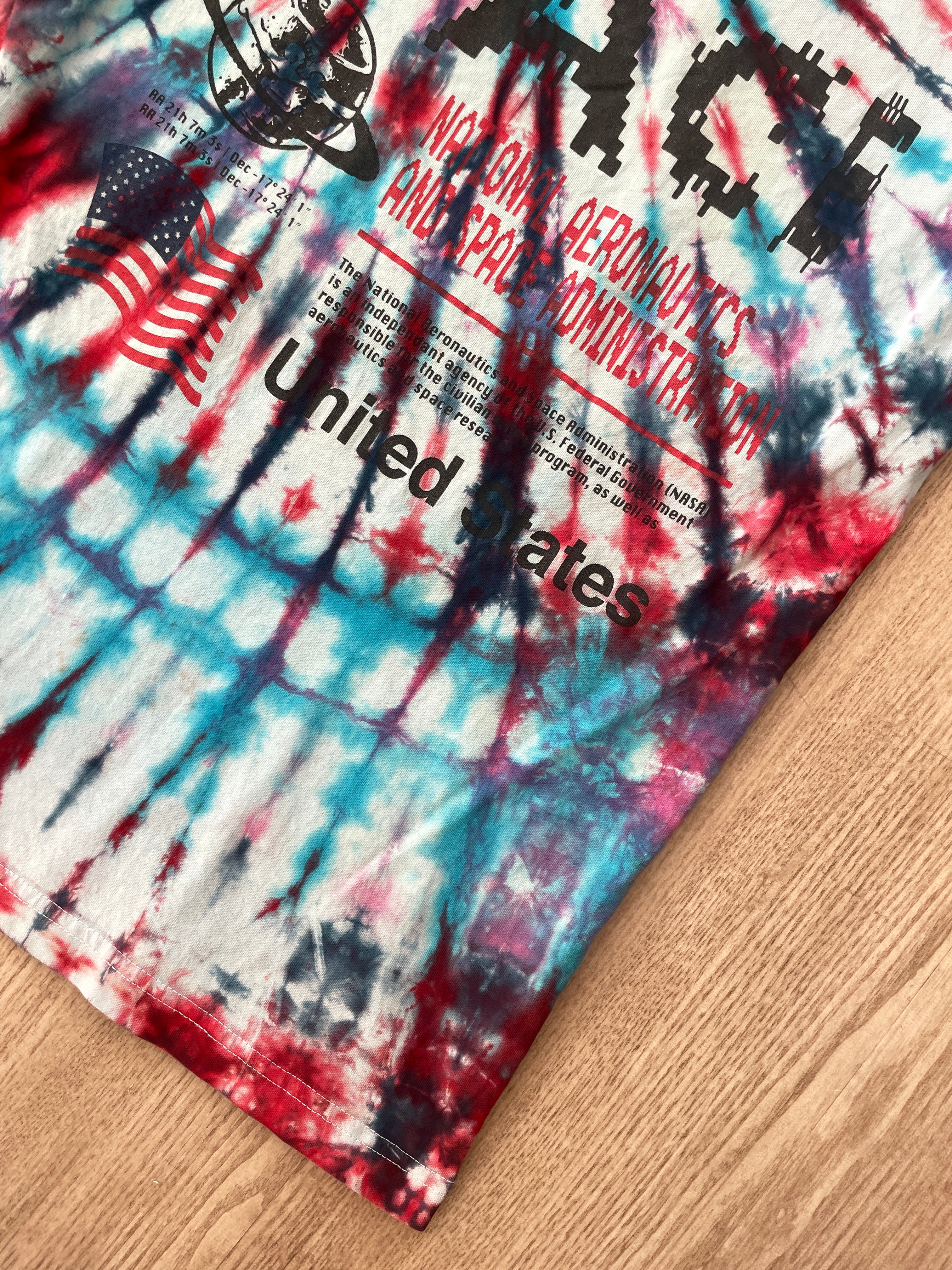 SMALL NASA Humans in Space Handmade Tie Dye Short Sleeve T-Shirt | One-Of-a-Kind Upcycled Red, White, and Blue Spiral Top