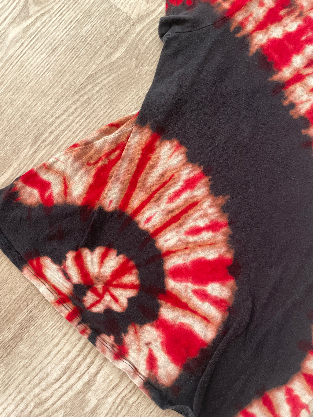 SMALL Women's Rolling Stones Handmade Reverse Tie Dye Short Sleeve T-Shirt | One-Of-a-Kind Upcycled Red and Black Spiral Top