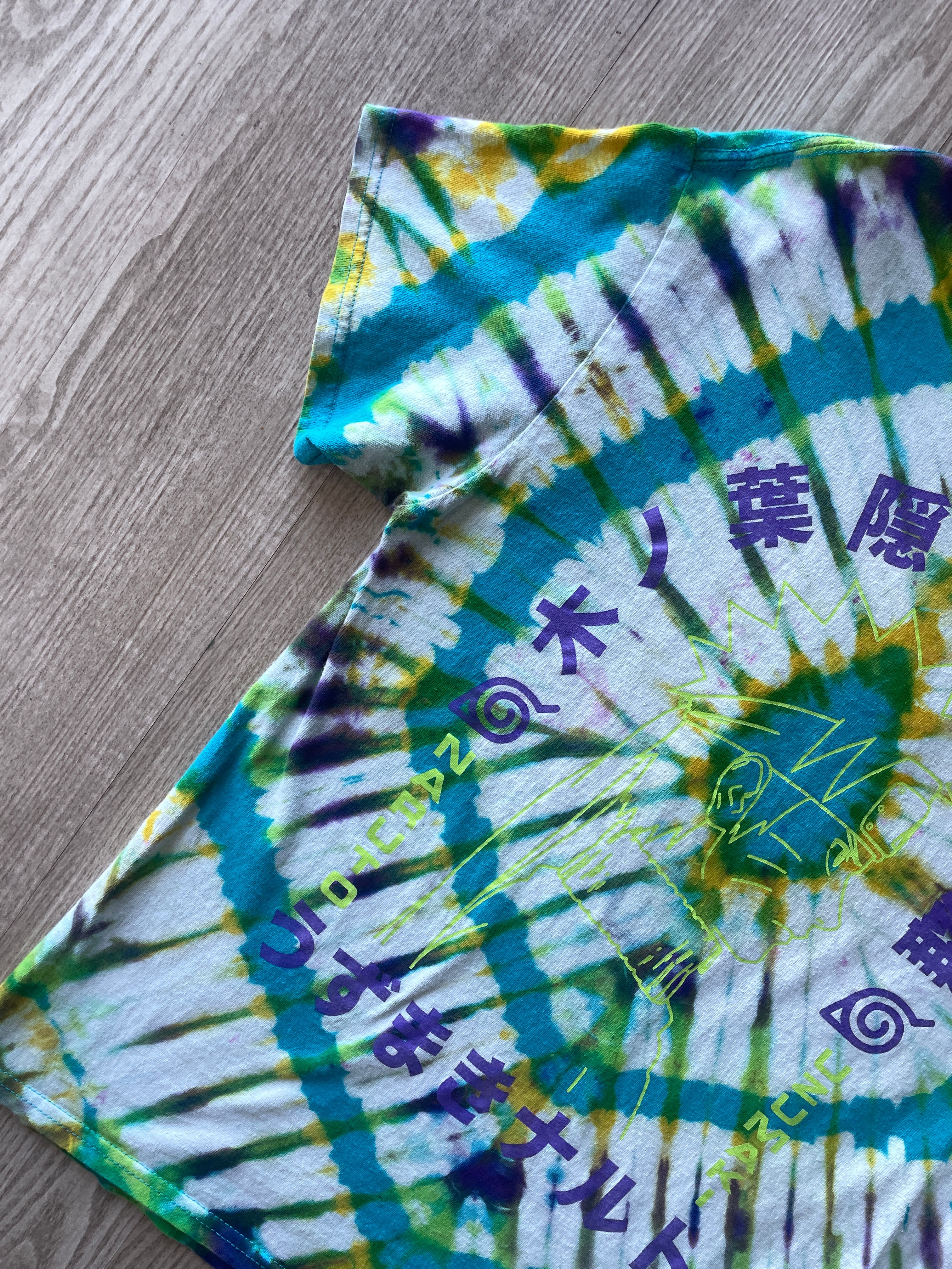 MEDIUM Men’s Naruto: Shippuden Handmade Reverse Tie Dye Short Sleeve T-Shirt | One-Of-a-Kind Upcycled Blue and White Pleated Top