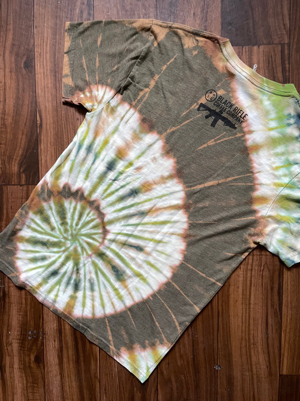 Medium Men's Black Rifle COFFEE Company Handmade Reverse Tie Dye Short Sleeve T-Shirt | One-Of-a-Kind Upcycled Brown and Green Spiral Tie Dye Top