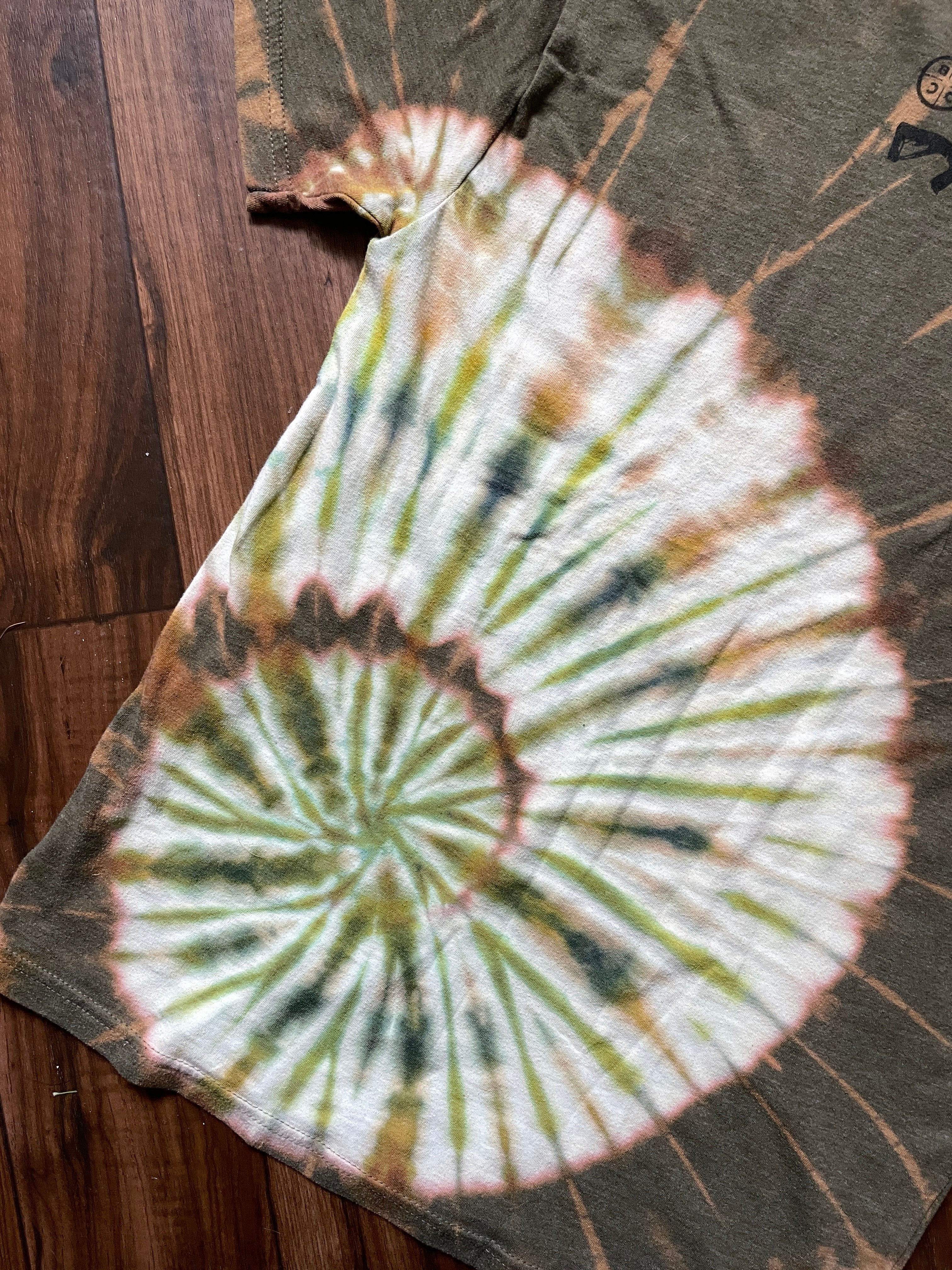 Medium Men's Black Rifle COFFEE Company Handmade Reverse Tie Dye Short Sleeve T-Shirt | One-Of-a-Kind Upcycled Brown and Green Spiral Tie Dye Top