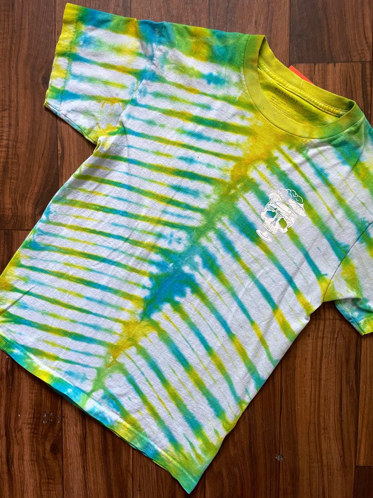 Medium Here's to Good Times Beach Skull Handmade Tie Dye Short Sleeve T-Shirt | One-Of-a-Kind Upcycled Blue and Green Pleated Tie Dye Top