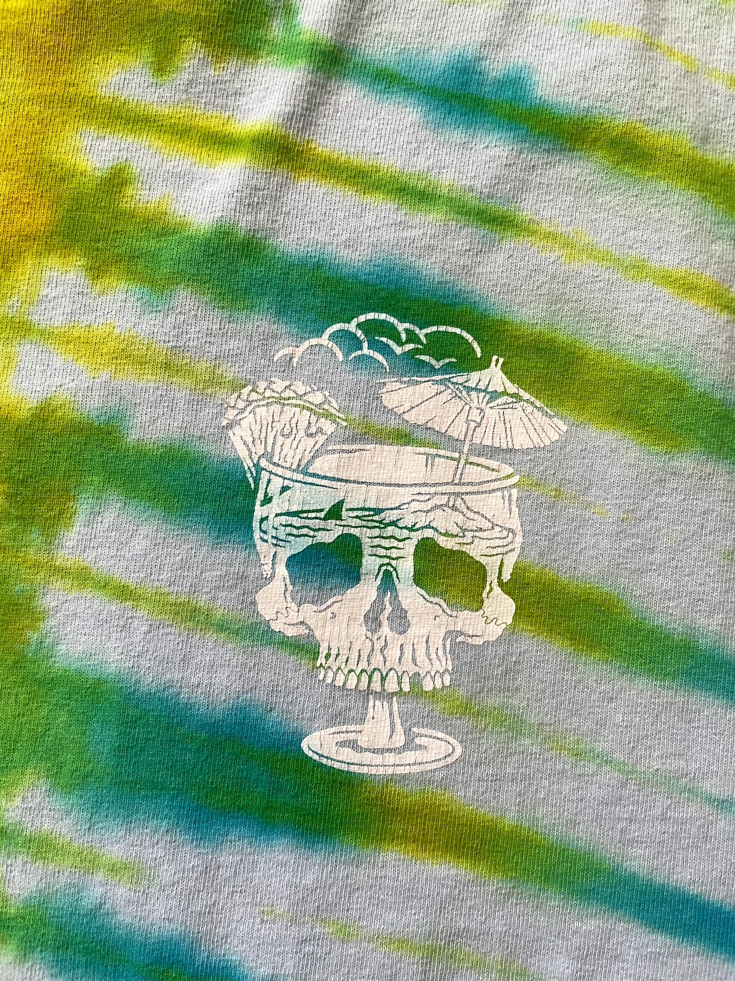 Medium Here's to Good Times Beach Skull Handmade Tie Dye Short Sleeve T-Shirt | One-Of-a-Kind Upcycled Blue and Green Pleated Tie Dye Top