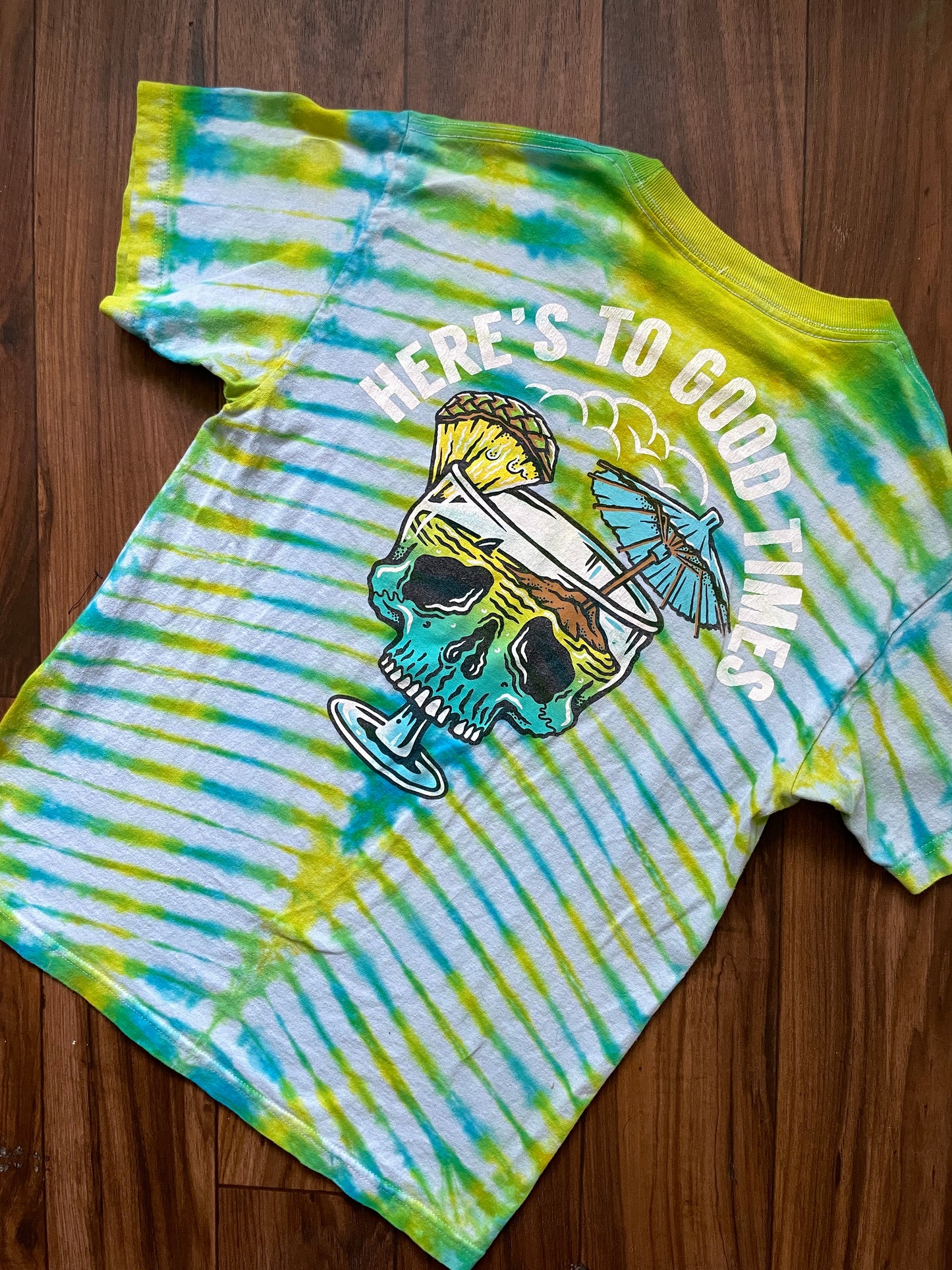 Medium Here's to Good Times Beach Skull Handmade Tie Dye Short Sleeve T-Shirt | One-Of-a-Kind Upcycled Blue and Green Pleated Tie Dye Top