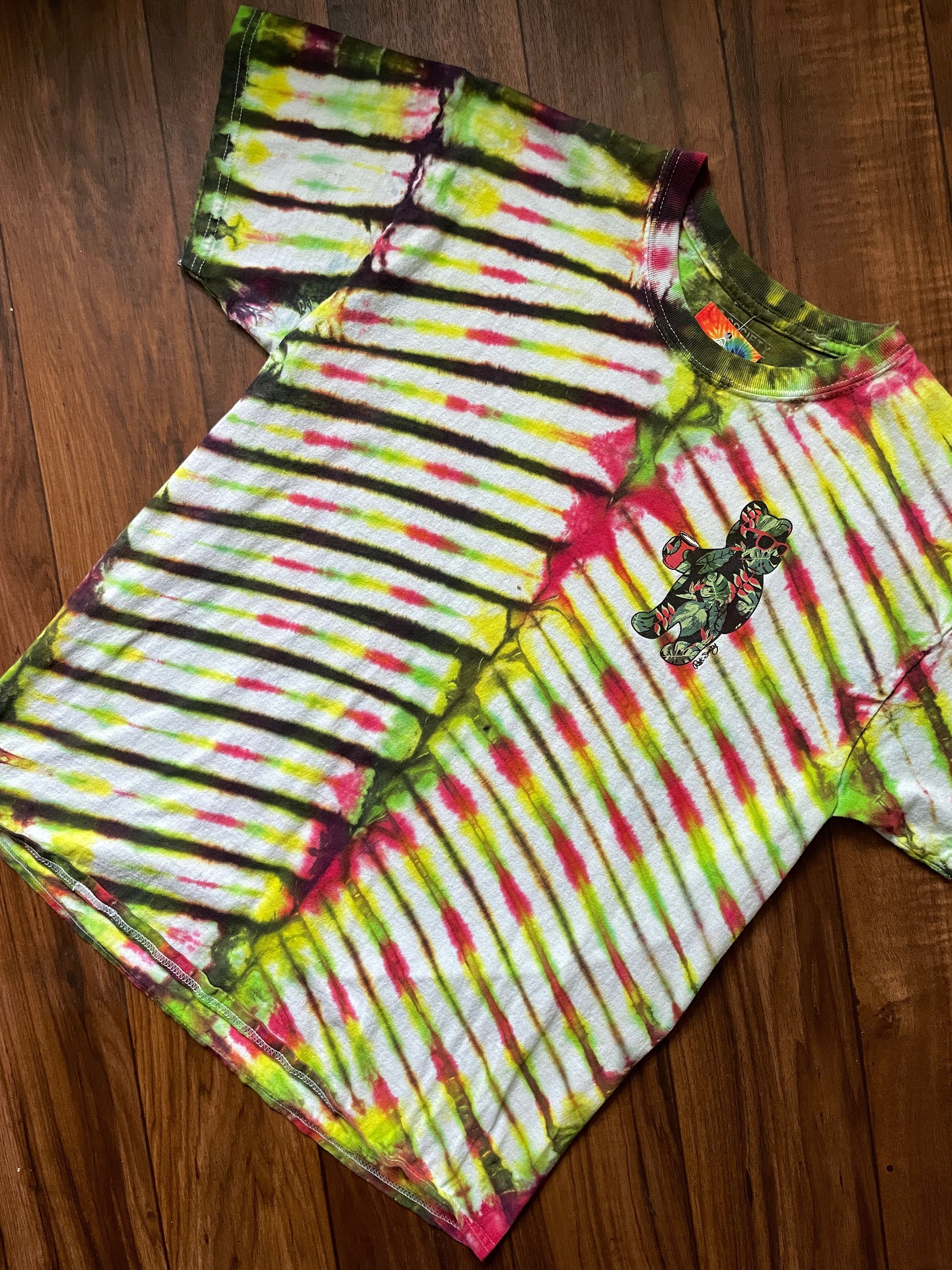 Large Men's Riot Society Rasta Bear Handmade Tie Dye Short Sleeve T-Shirt | One-Of-a-Kind Upcycled Red, Yellow, and Green V-Pleated Tie Dye Top