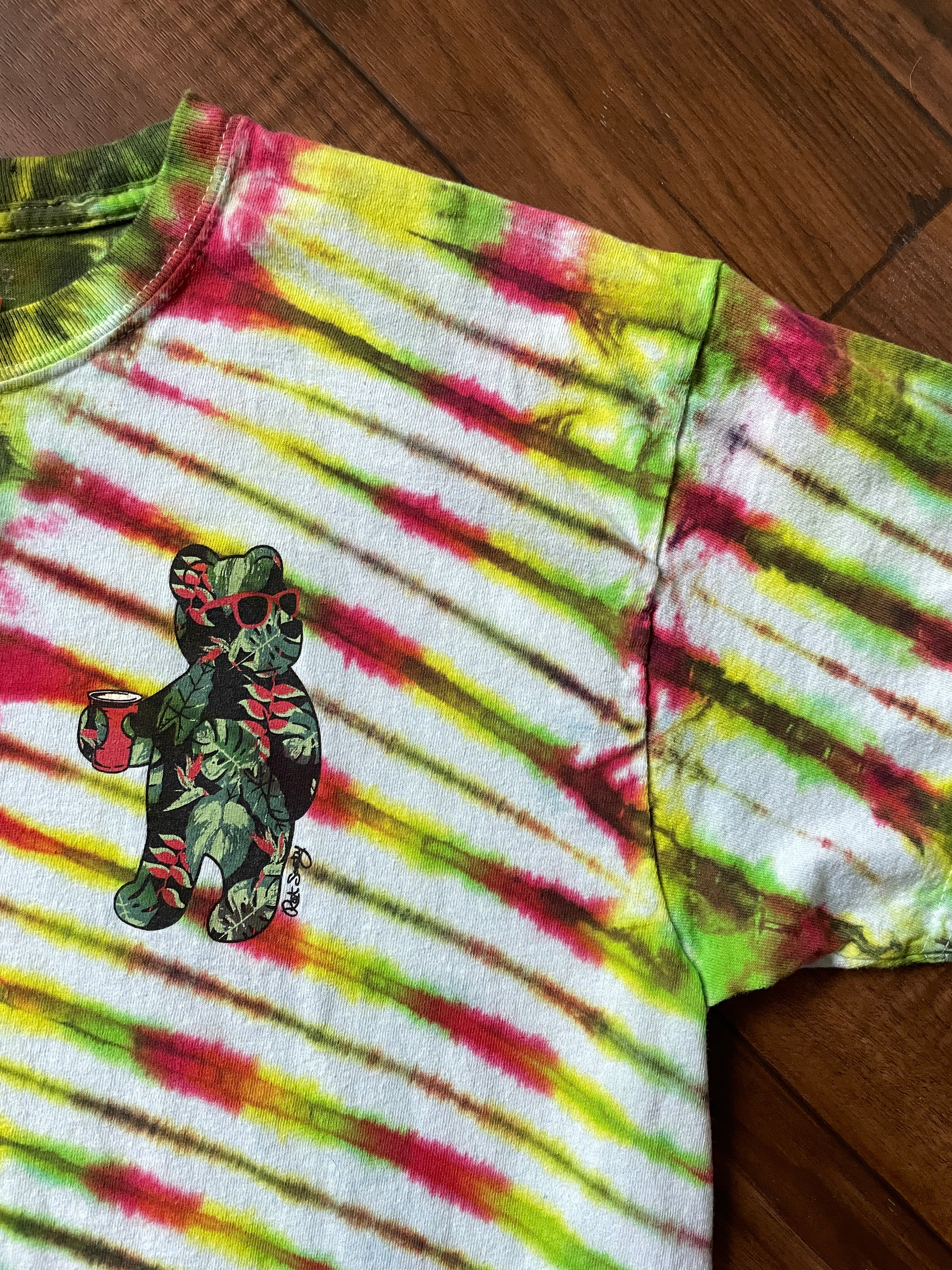 Large Men's Riot Society Rasta Bear Handmade Tie Dye Short Sleeve T-Shirt | One-Of-a-Kind Upcycled Red, Yellow, and Green V-Pleated Tie Dye Top
