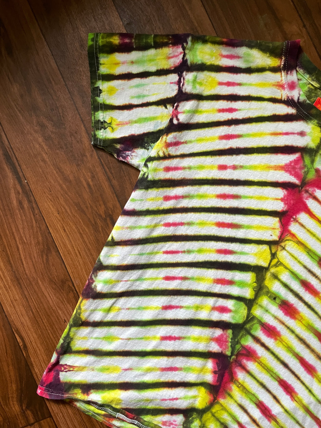 Large Men's Riot Society Rasta Bear Handmade Tie Dye Short Sleeve T-Shirt | One-Of-a-Kind Upcycled Red, Yellow, and Green V-Pleated Tie Dye Top