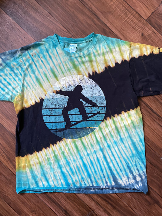 XL Men's Snowboarder Handmade Reverse Tie Dye Short Sleeve T-Shirt | One-Of-a-Kind Upcycled Black, Blue, and Green Pleated Tie Dye Top