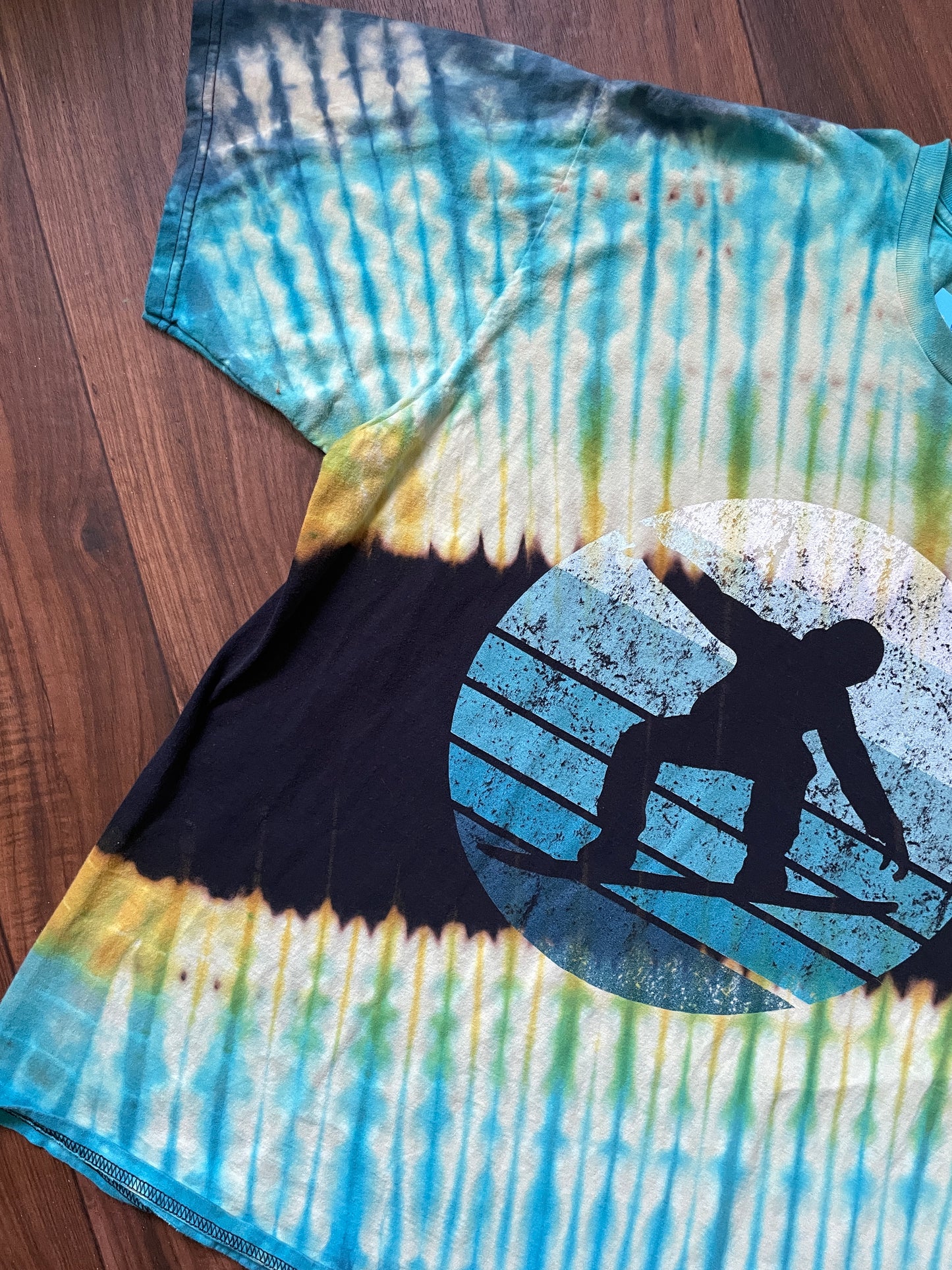 XL Men's Snowboarder Handmade Reverse Tie Dye Short Sleeve T-Shirt | One-Of-a-Kind Upcycled Black, Blue, and Green Pleated Tie Dye Top