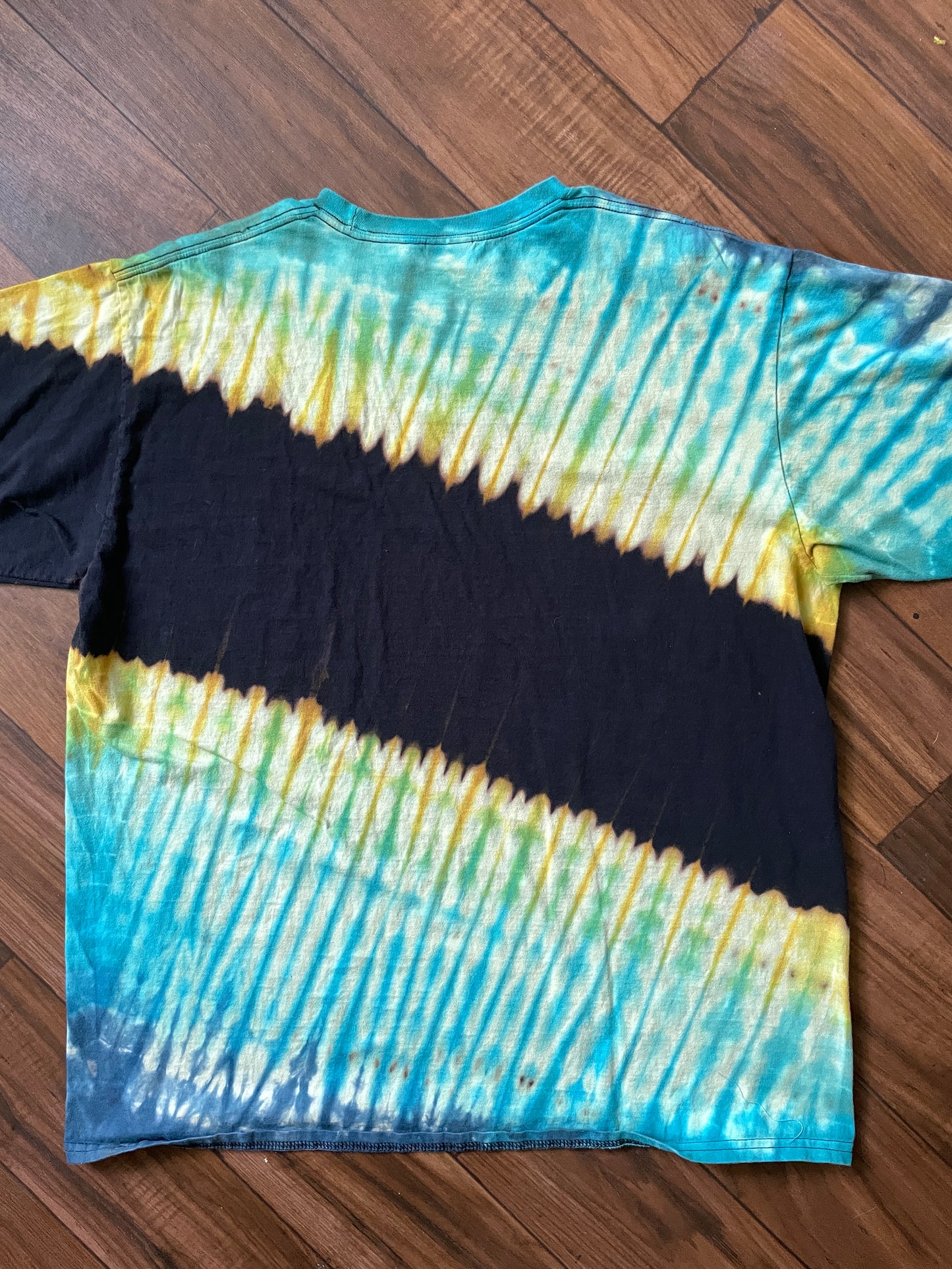 XL Men's Snowboarder Handmade Reverse Tie Dye Short Sleeve T-Shirt | One-Of-a-Kind Upcycled Black, Blue, and Green Pleated Tie Dye Top