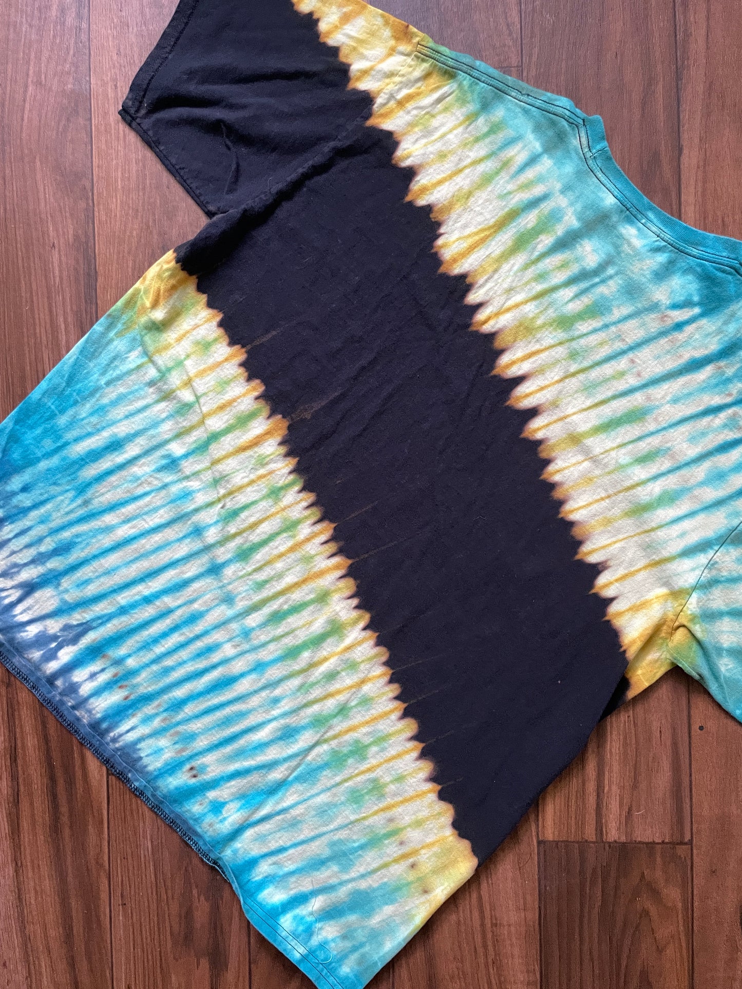 XL Men's Snowboarder Handmade Reverse Tie Dye Short Sleeve T-Shirt | One-Of-a-Kind Upcycled Black, Blue, and Green Pleated Tie Dye Top