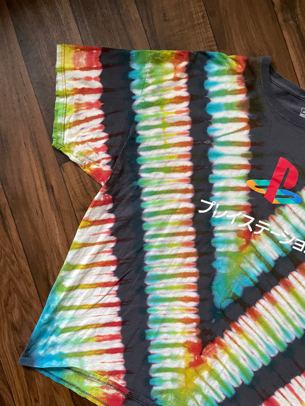 Playstation Japan Handmade Reverse Tie Dye Short Sleeve T-Shirt | One-Of-a-Kind Upcycled Gray, Red, and Blue V-Pleated Tie Dye Top | Men's 3XL