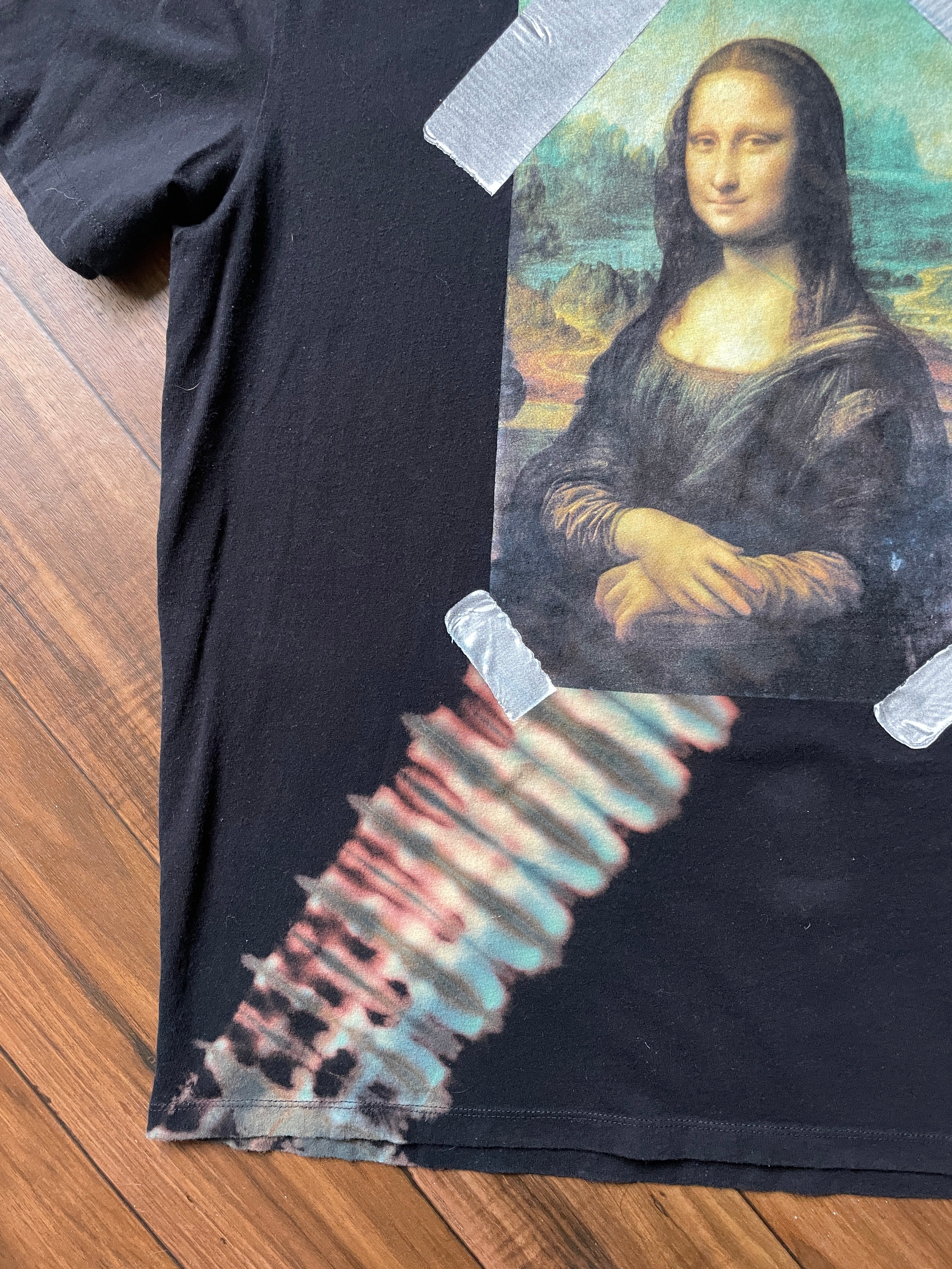 Mona Lisa Duct Tape Handmade Reverse Tie Dye Short Sleeve T-Shirt | One-Of-a-Kind Upcycled Black and Blue Tie Dye Top | Men's XL