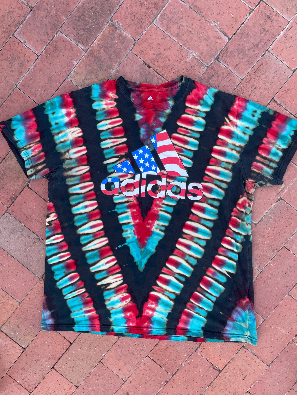 XL Men's adidas American Flag Handmade Reverse Tie Dye Short Sleeve T-Shirt | One-Of-a-Kind Upcycled Black, Red, White, and Blue V-Pleated Top