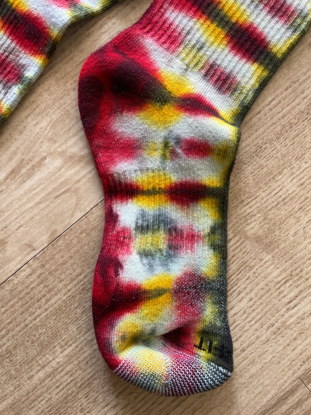NIKE Socks Hand Tie Dyed Black, Red, and Yellow Nike Dri-FIT Everyday Plus Crew Training Socks - Size Large (Men's 8-12/Women's 10-13)