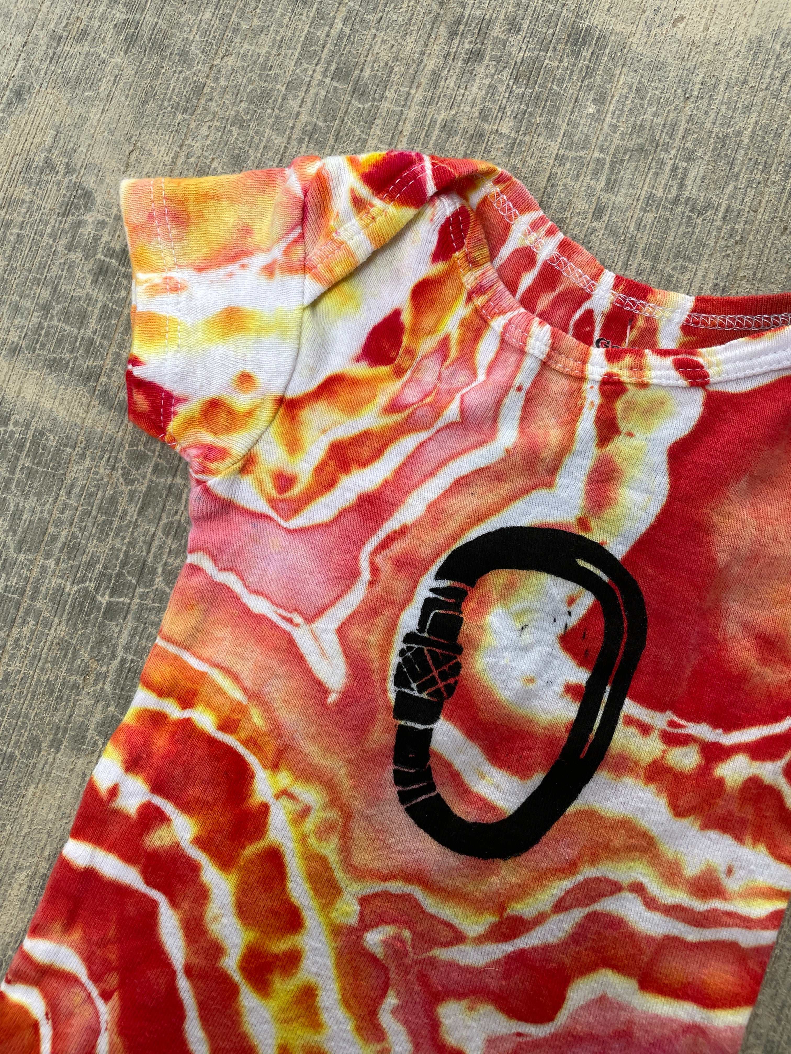 0-3 MO Climbing Carabiner Red, Pink, Orange, and Yellow Geode Short Sleeve Tie Dye Baby Onesie