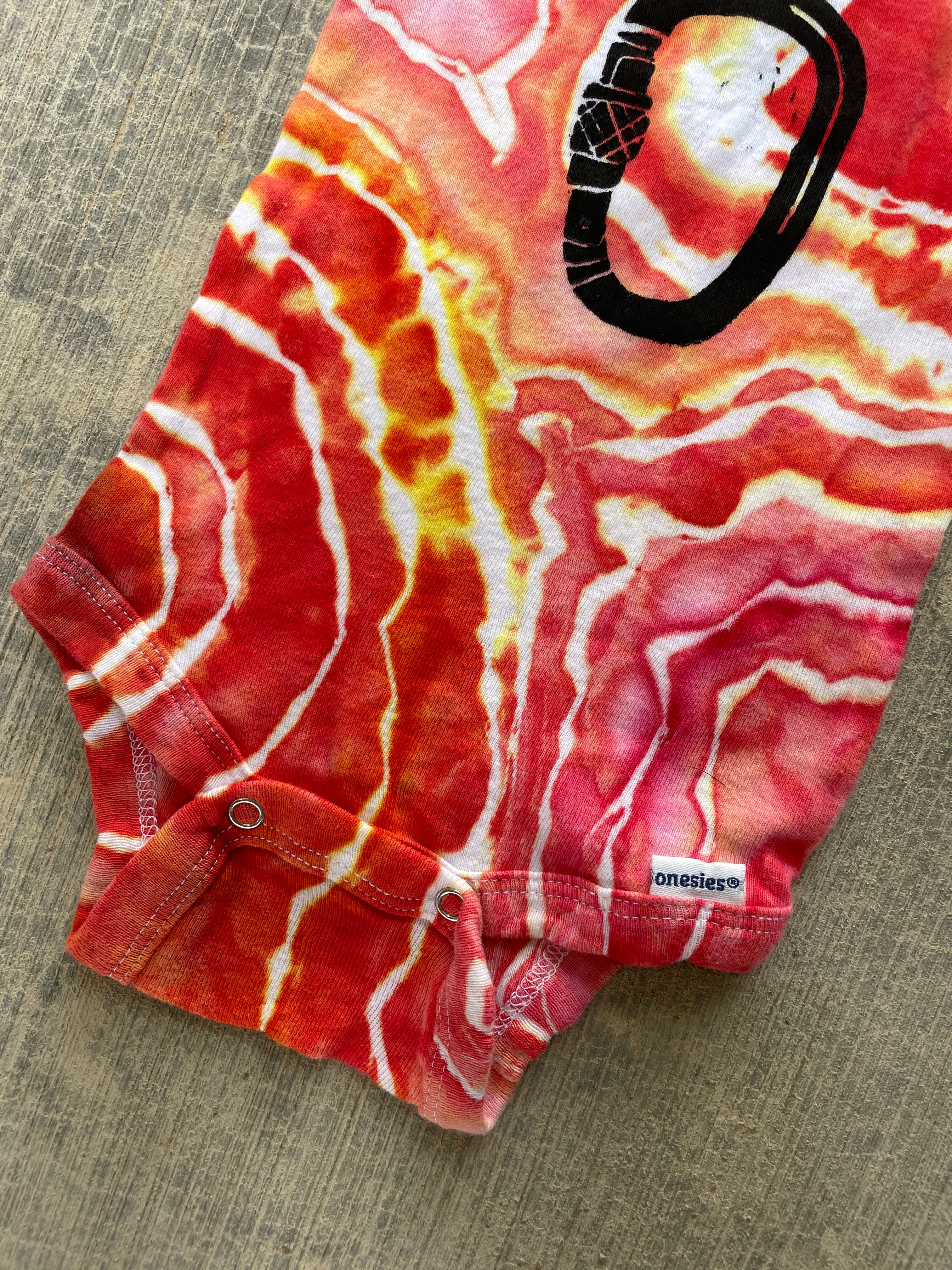 0-3 MO Climbing Carabiner Red, Pink, Orange, and Yellow Geode Short Sleeve Tie Dye Baby Onesie