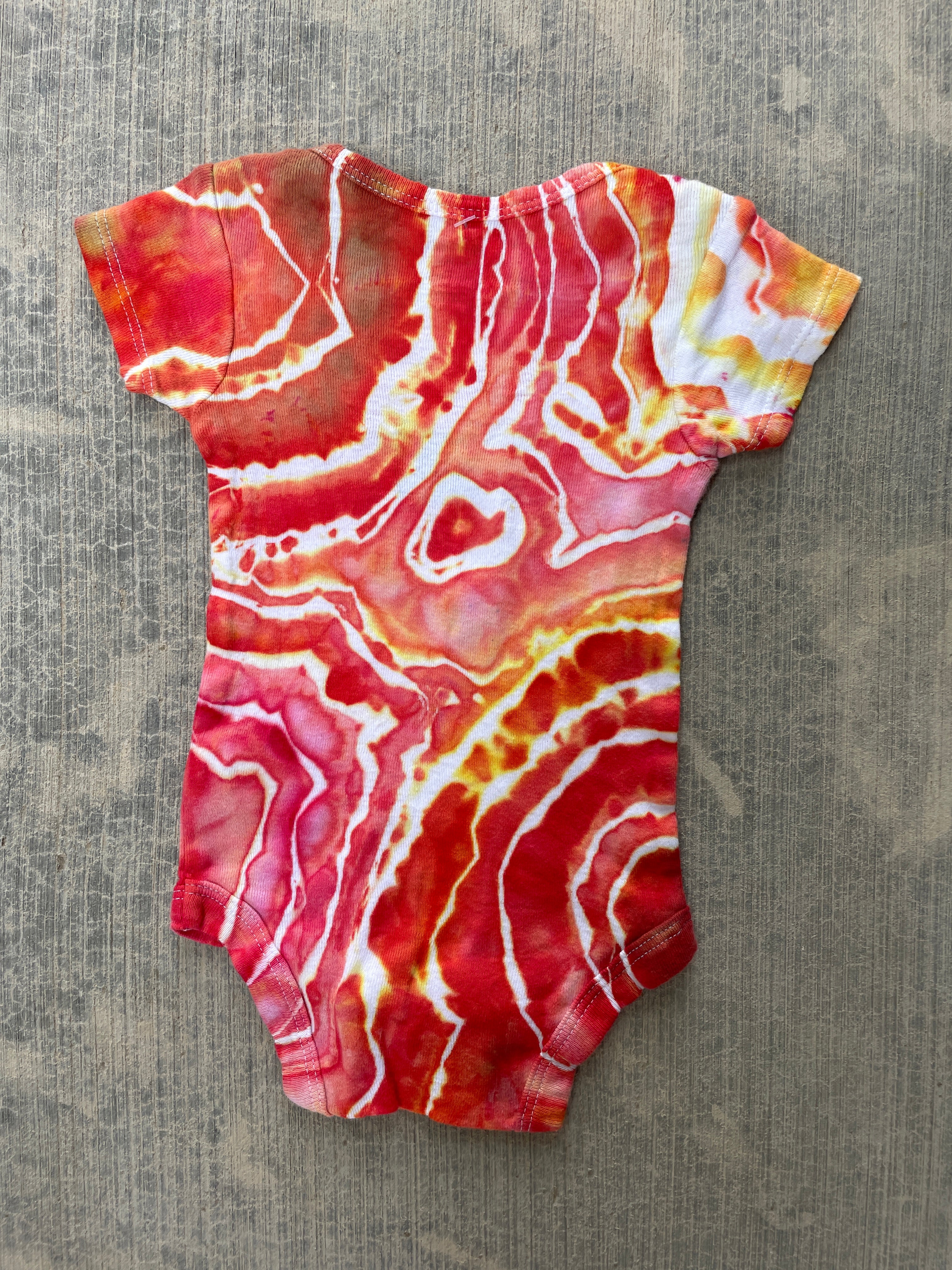 0-3 MO Climbing Carabiner Red, Pink, Orange, and Yellow Geode Short Sleeve Tie Dye Baby Onesie