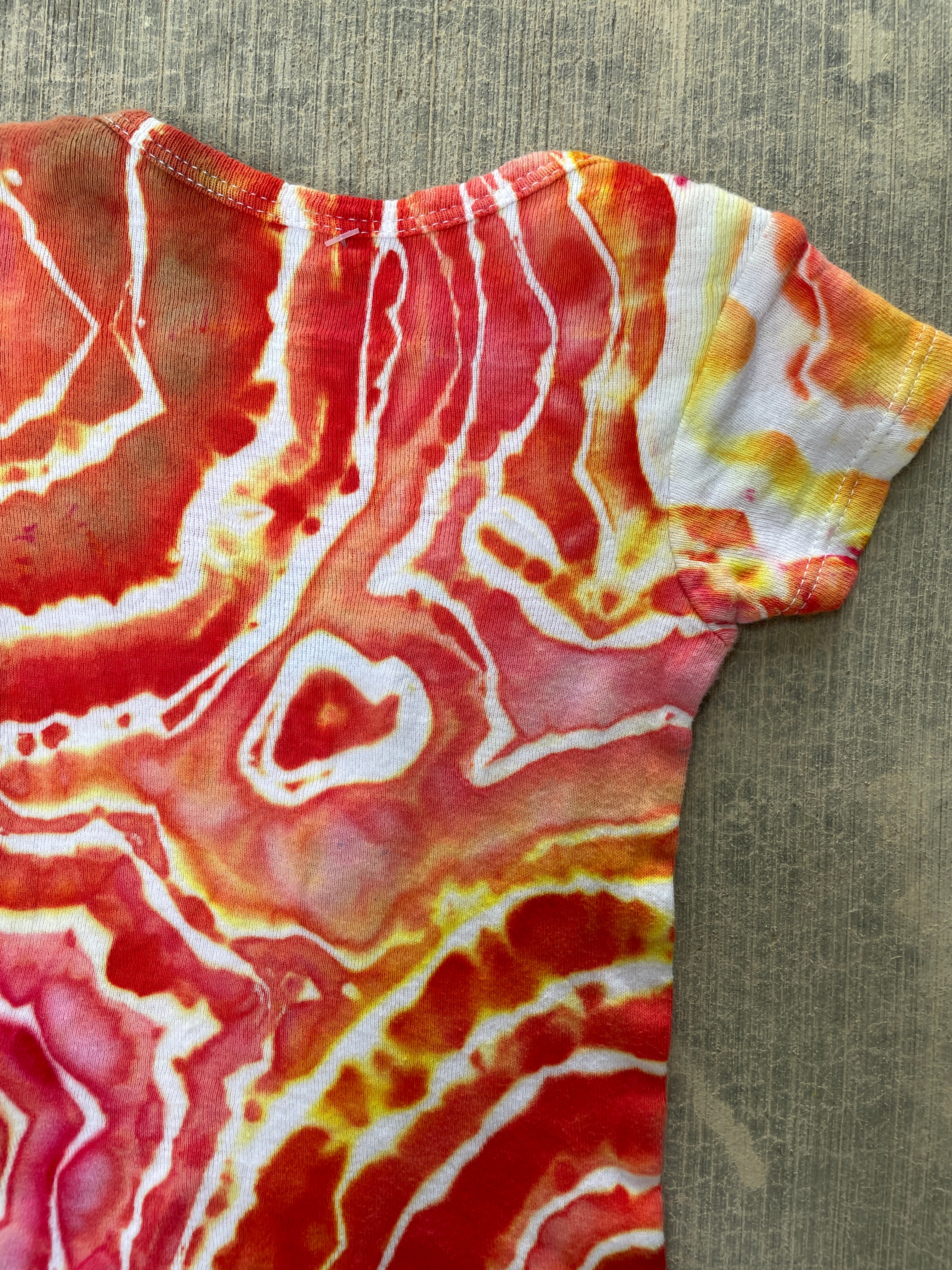 0-3 MO Climbing Carabiner Red, Pink, Orange, and Yellow Geode Short Sleeve Tie Dye Baby Onesie