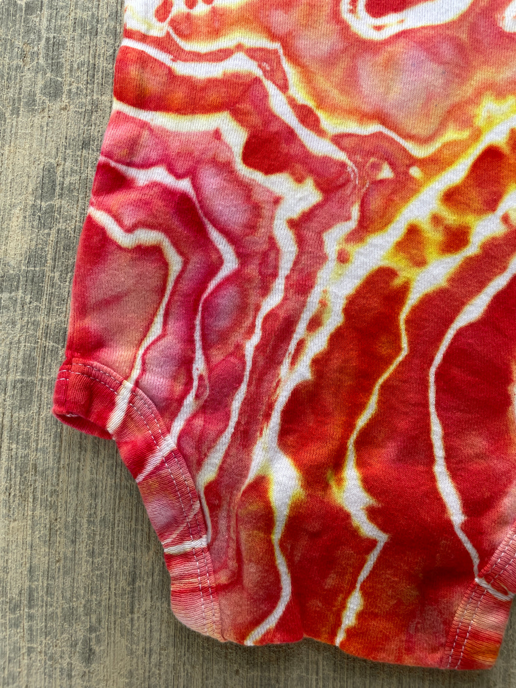 0-3 MO Climbing Carabiner Red, Pink, Orange, and Yellow Geode Short Sleeve Tie Dye Baby Onesie