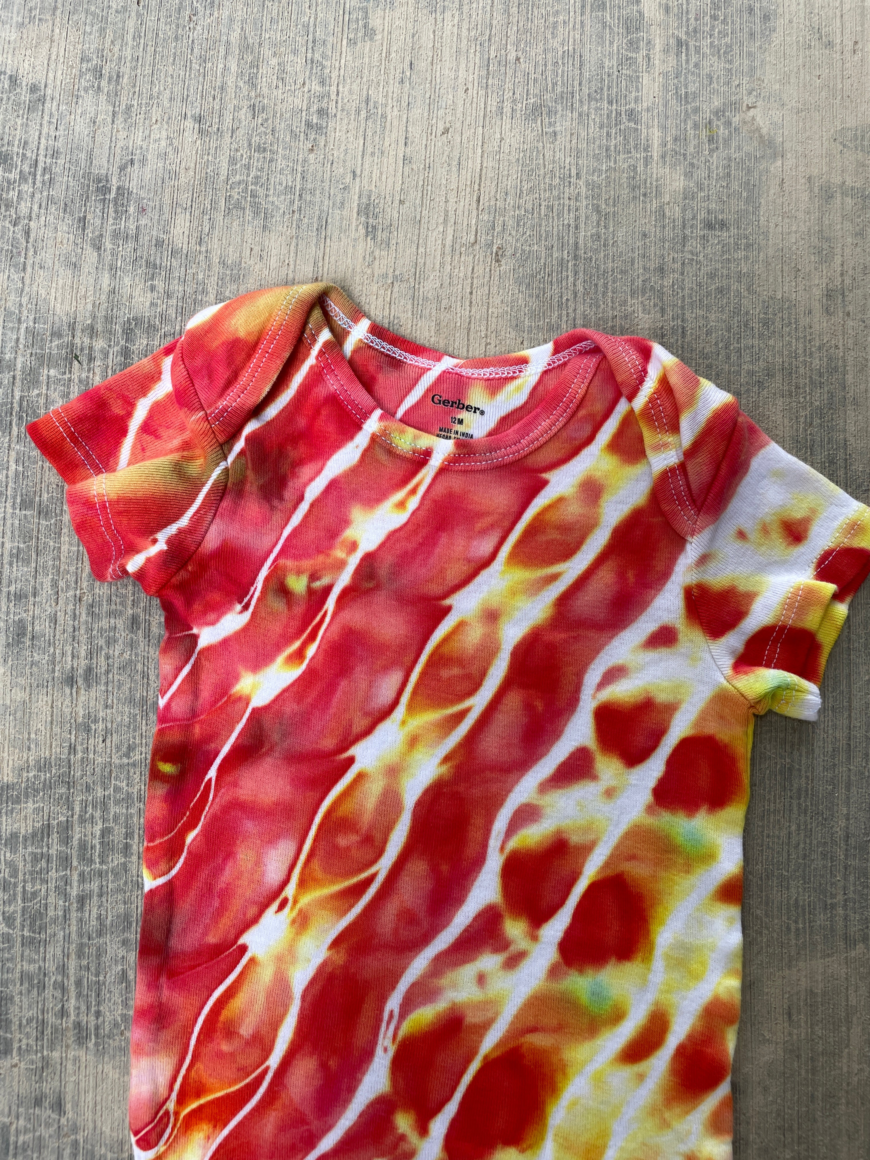 12 MO Red, Orange, and Yellow Geode Short Sleeve Tie Dye Baby Onesie