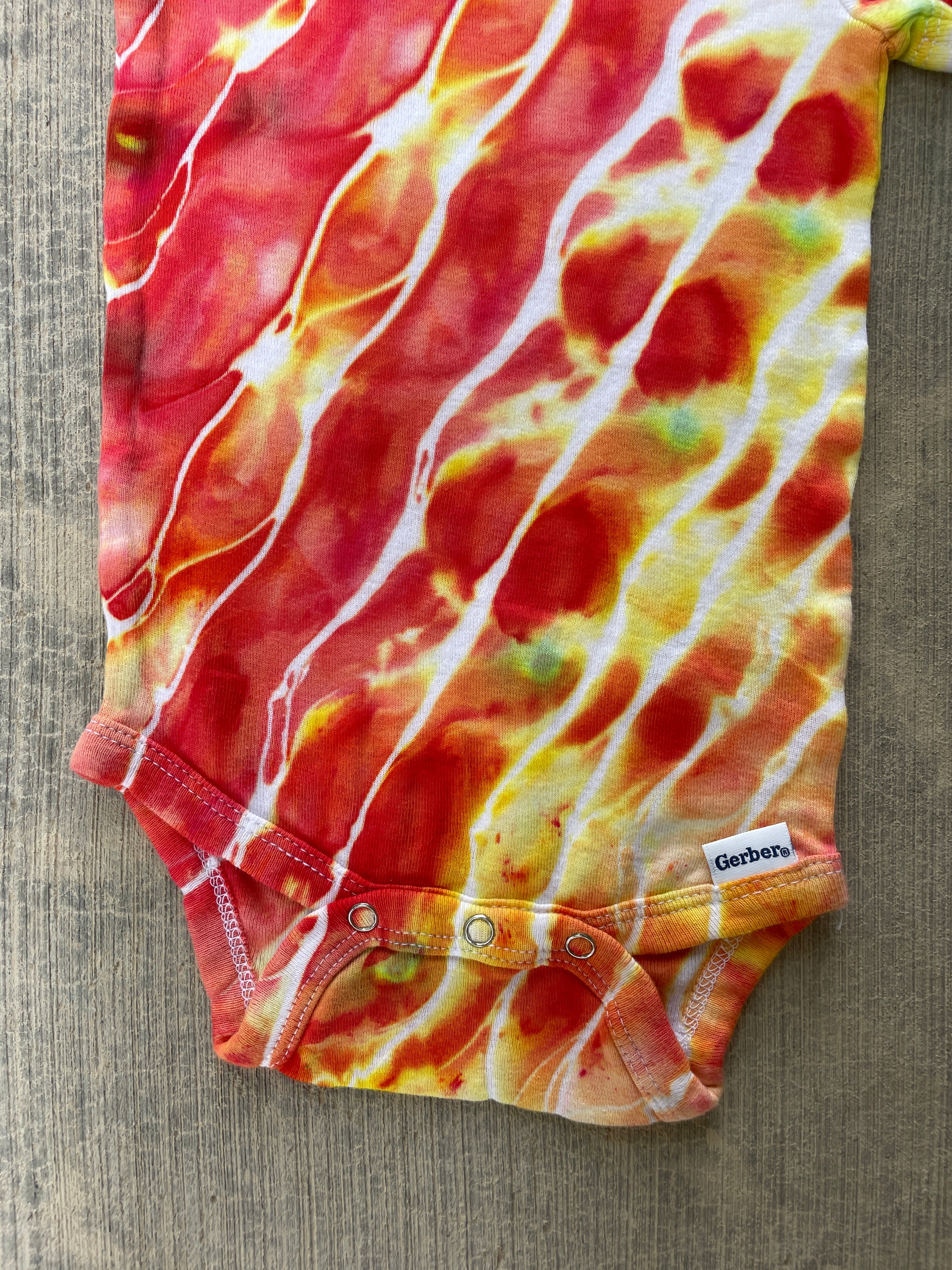 12 MO Red, Orange, and Yellow Geode Short Sleeve Tie Dye Baby Onesie