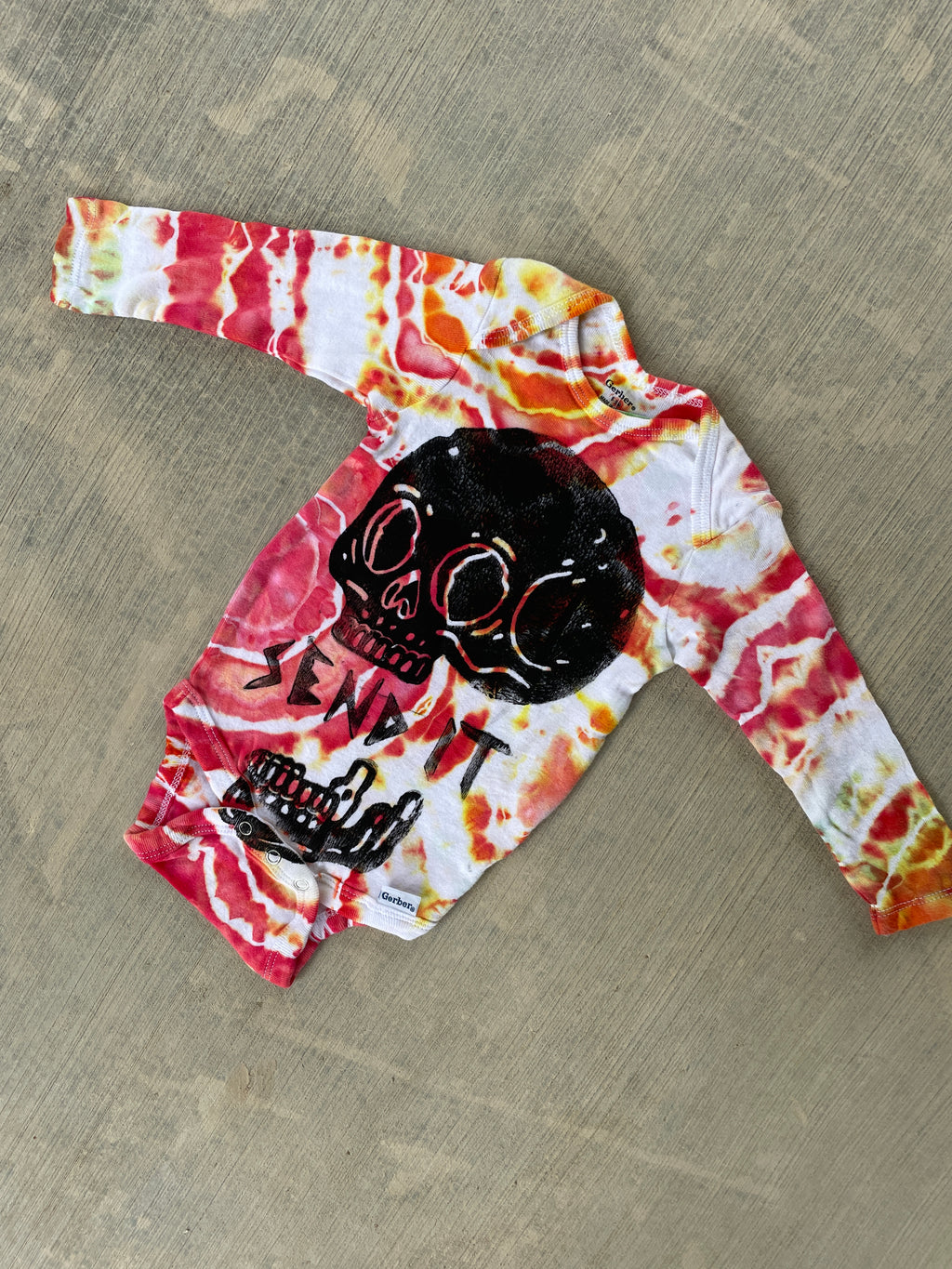 6-9 MO Send It Skull Red, Orange, and Yellow Long Sleeve Tie Dye Baby Onesie