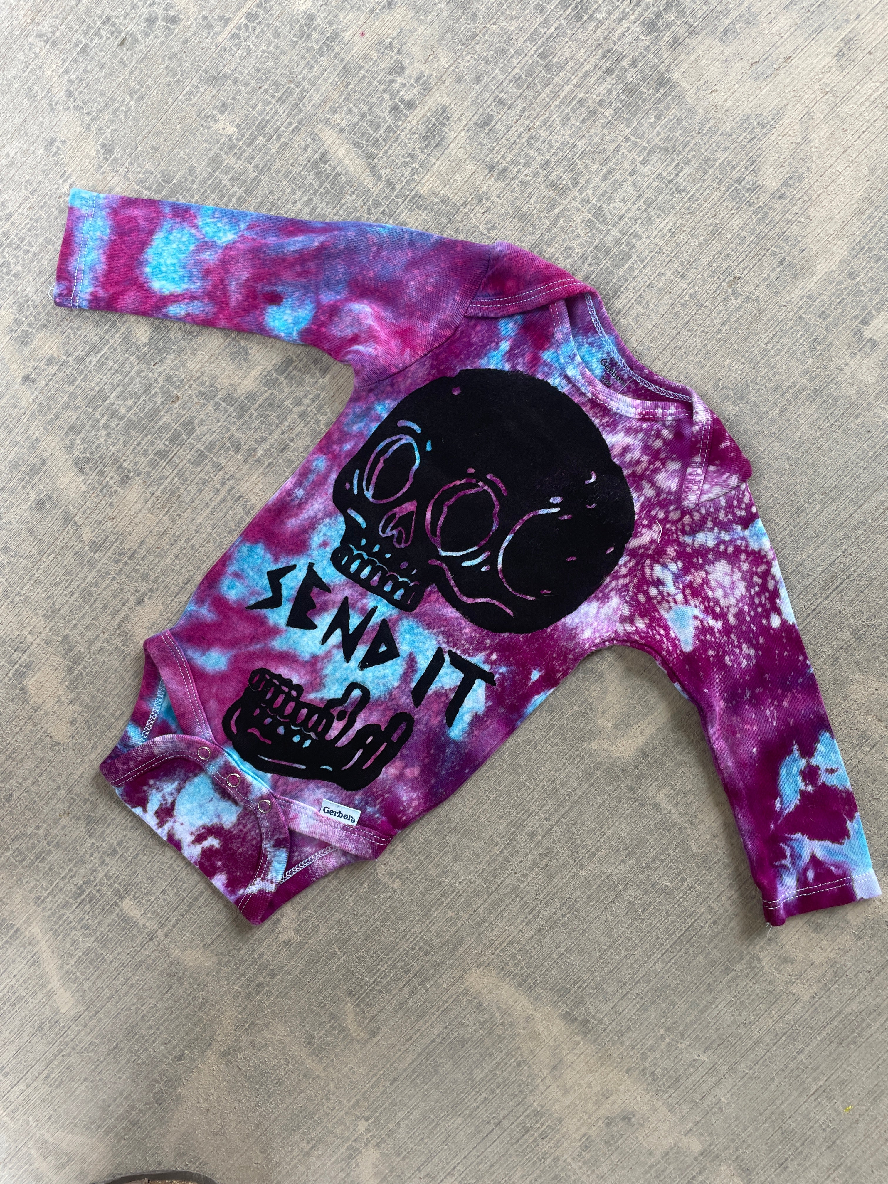 6-9 MO Send It Skull Blue, Purple, and Pink Long Sleeve Galaxy Dye Baby Onesie