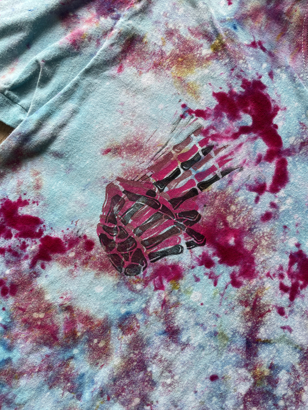 Medium Men's Hand-Printed Skeleton Peace Sign Galaxy Ice Dye Short Sleeve T-Shirt | Handmade One-Of-a-Kind Upcycled Pastel Blue and Pink Top