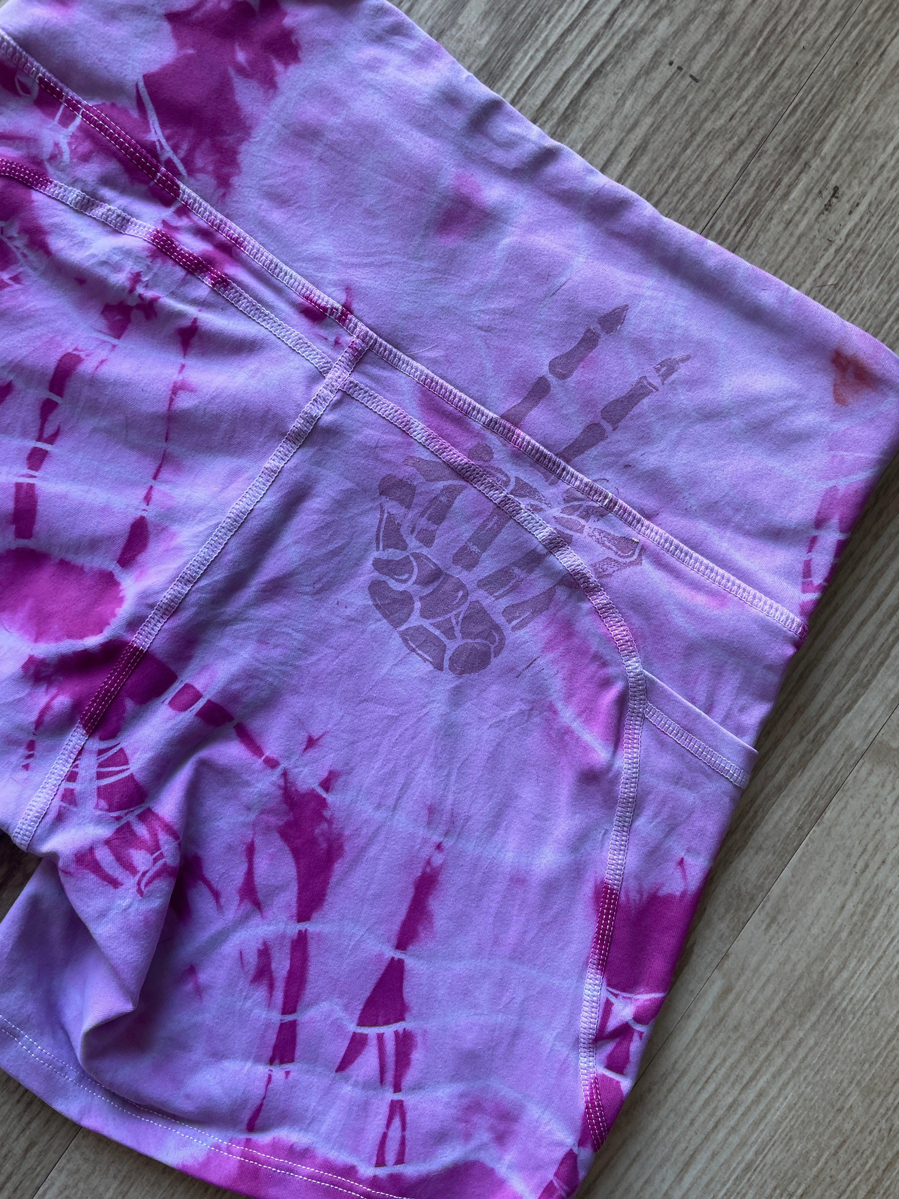 Small Women's Pastel Pink Geode Bike Shorts with Pockets and Peace Skellie Hands Graphic | High-Waist Yoga Workout Running Shorts with Deep Pockets