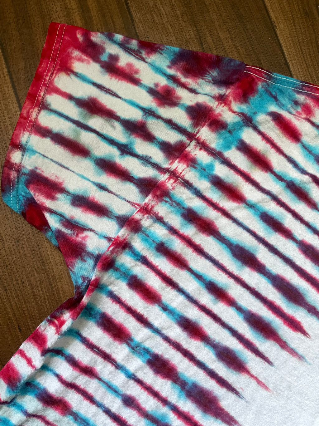 XL Men's Tupac Shakur Poetic Justice Handmade Tie Dye Short Sleeve T-Shirt | One-Of-a-Kind Upcycled Olive White, Blue, and Red Pleated Top