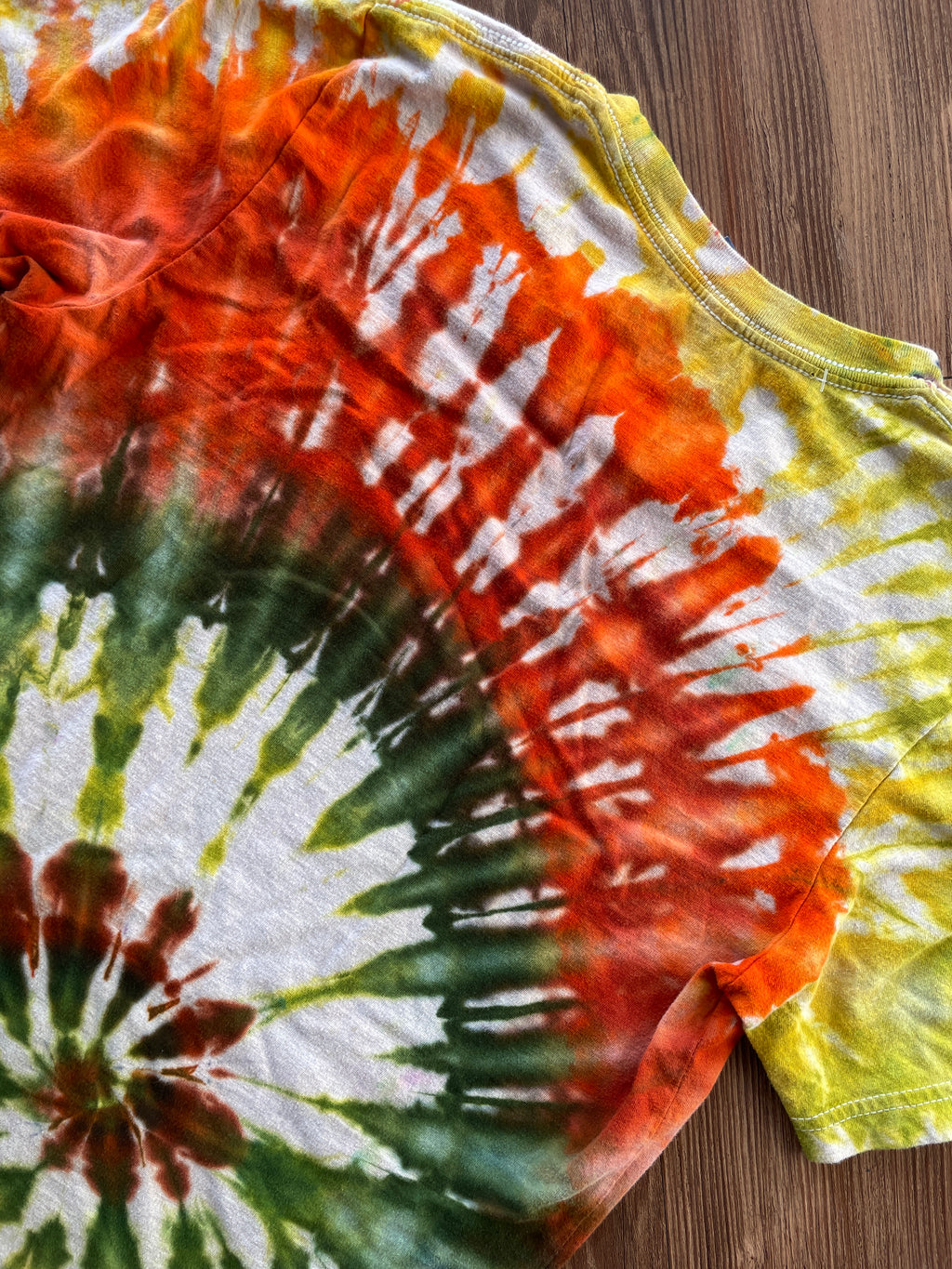 MEDIUM Women’s Crag to Crux Earth Tones Spiral Handmade Tie Dye T-Shirt | Green, Brown, and Orange Spiral Short Sleeve