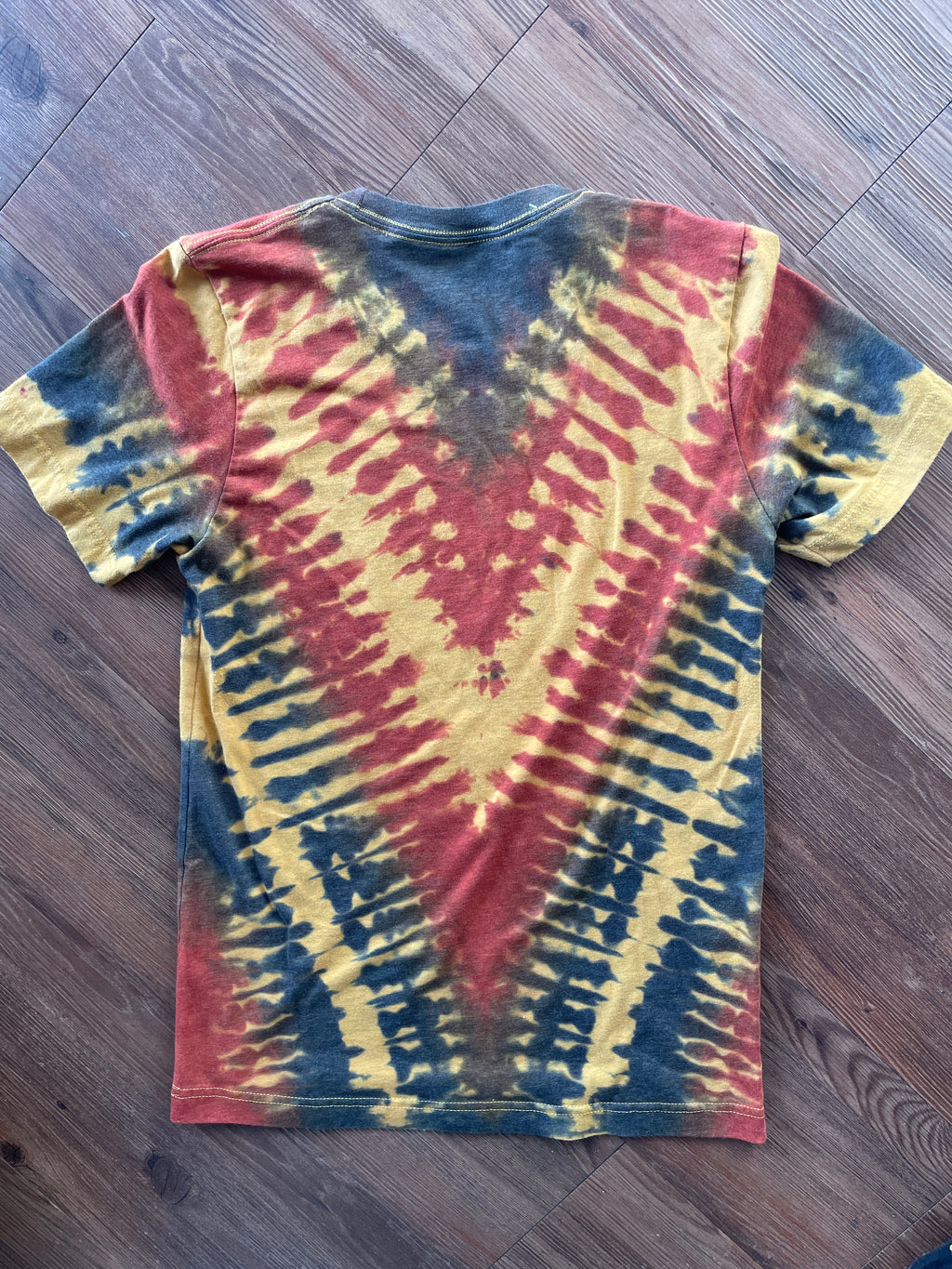 MEDIUM Men’s Fuck Racism Crag to Crux Handmade Tie Dye T-Shirt | Yellow, Brown, and Black V-Pleated Short Sleeve