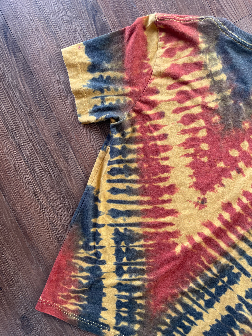 MEDIUM Men’s Fuck Racism Crag to Crux Handmade Tie Dye T-Shirt | Yellow, Brown, and Black V-Pleated Short Sleeve