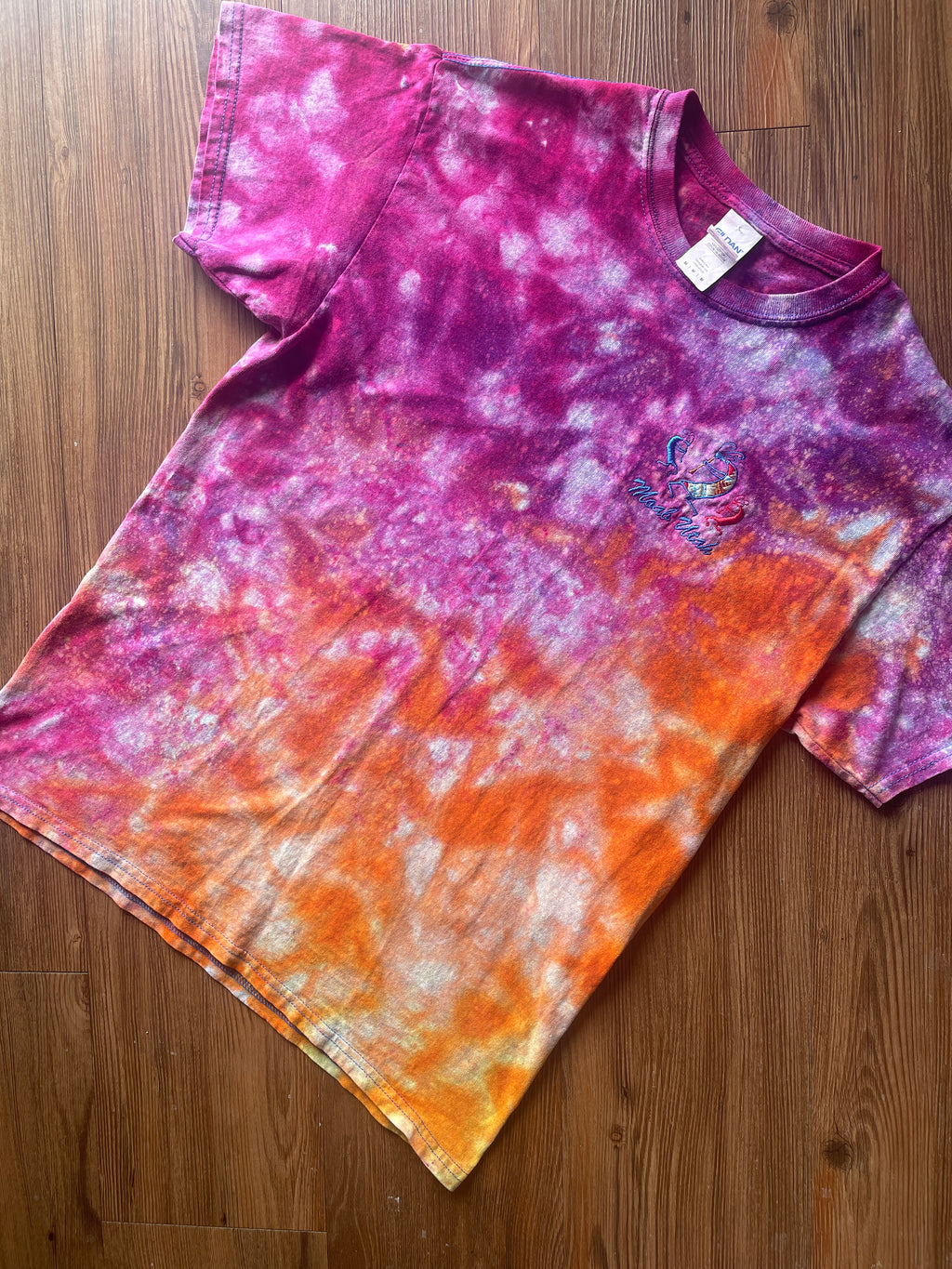 Medium Men’s Moab Utah Handmade Tie Dye T-Shirt with Embroidered Kokopelli Details | Pink and Orange Galaxy Reverse Tie Dye Short Sleeve