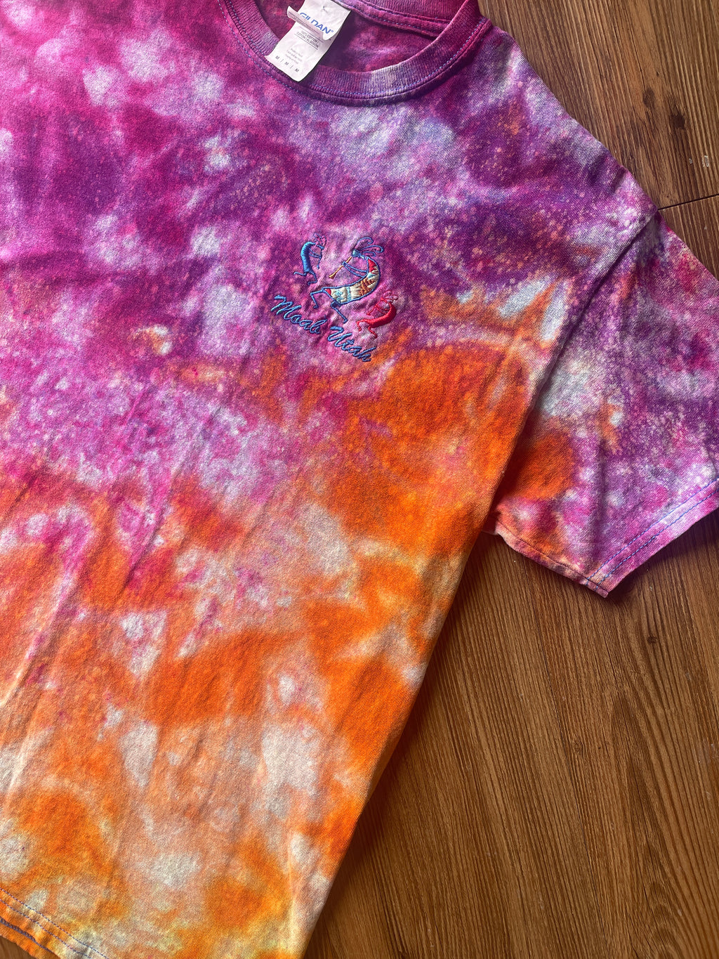 Medium Men’s Moab Utah Handmade Tie Dye T-Shirt with Embroidered Kokopelli Details | Pink and Orange Galaxy Reverse Tie Dye Short Sleeve