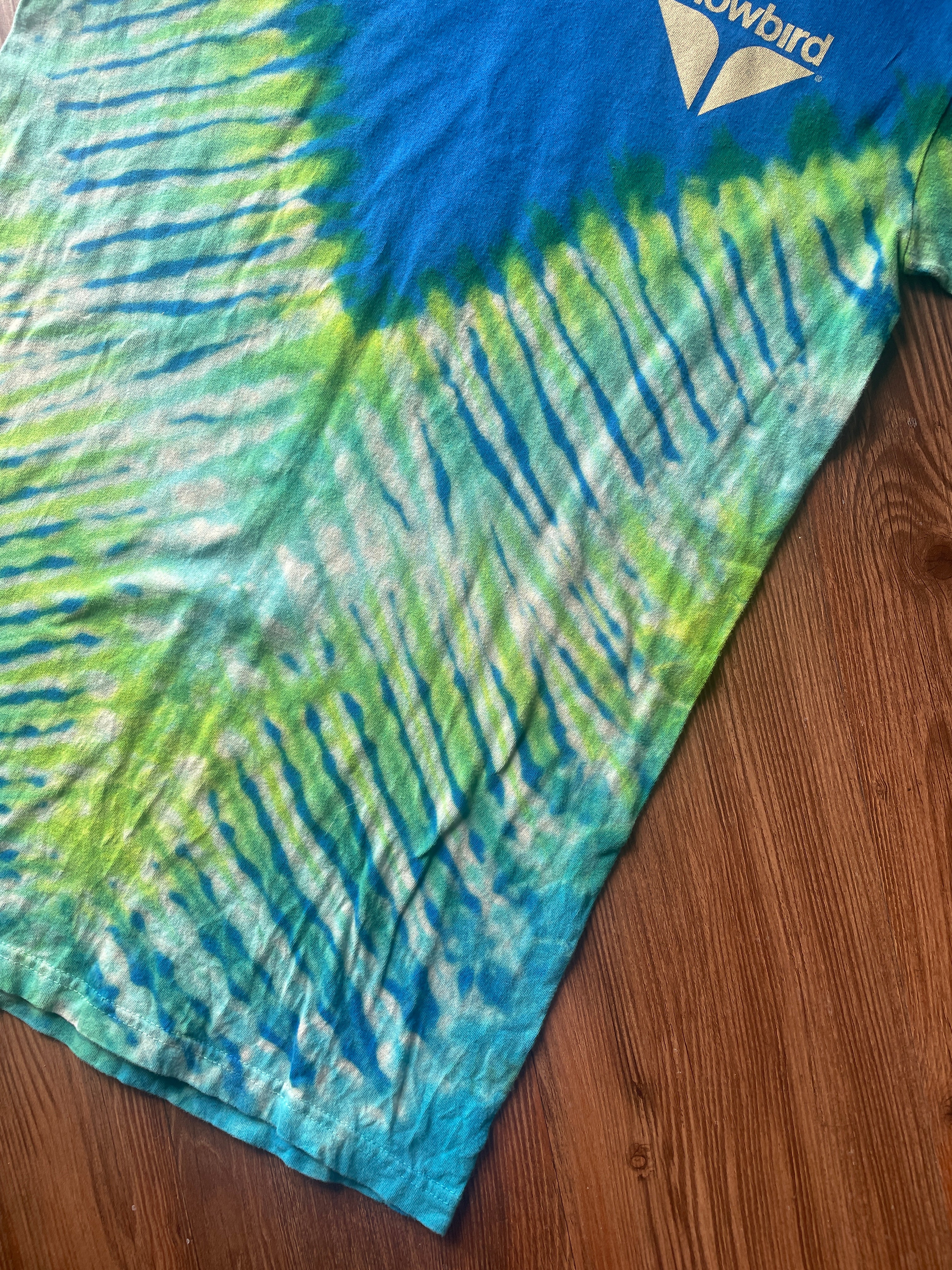 Small Men’s Snowbird Octoberfest Handmade Tie Dye T-Shirt | Utah Snowbird Ski Resort Blue and Green V-Pleated Tie Dye Short Sleeve